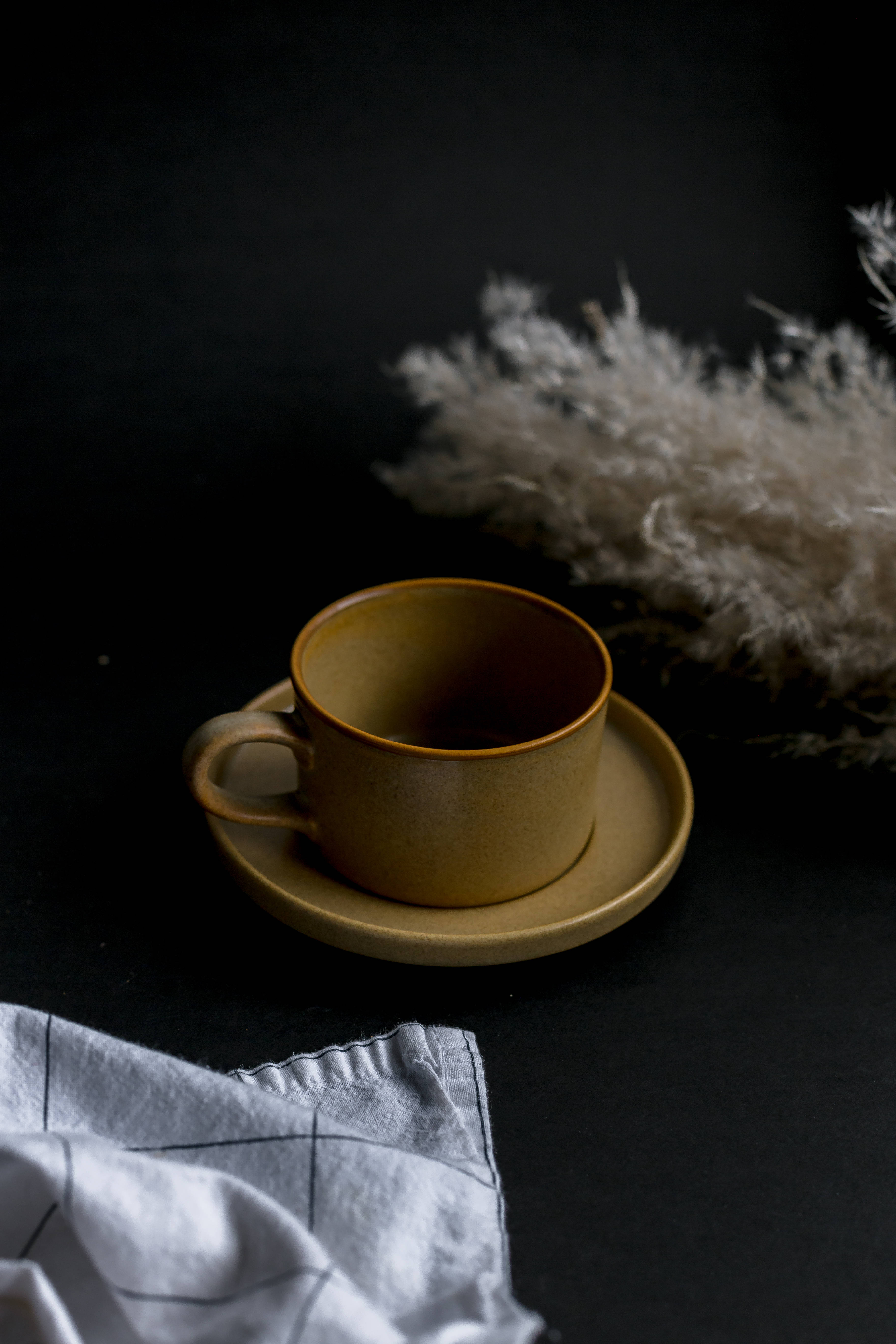 matte mustard ceramic cup, saucer, black surface, 5K Phone Wallpaper