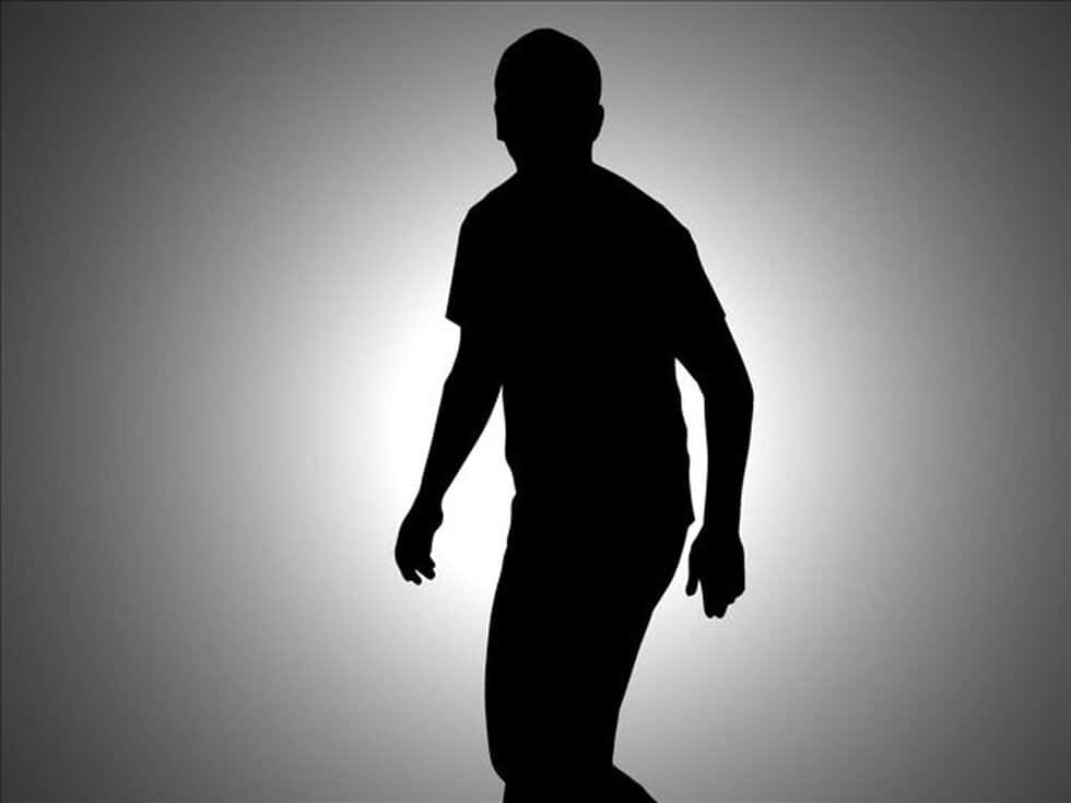 stark black silhouette, person walking, soft gradient gray background, SD Desktop Wallpaper