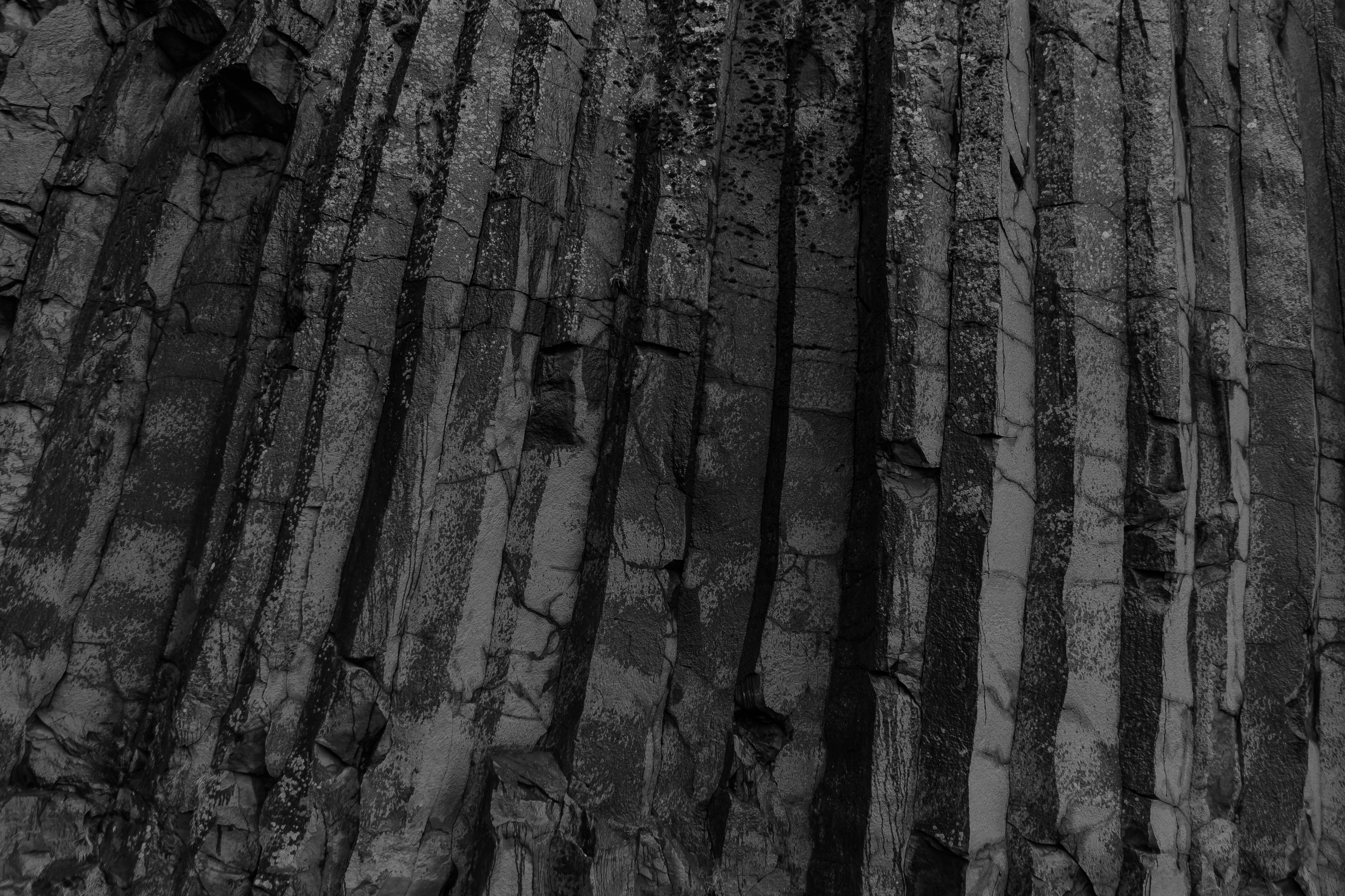 basalt columns, rugged basalt, dramatic natural rock face, 4K Desktop Wallpaper