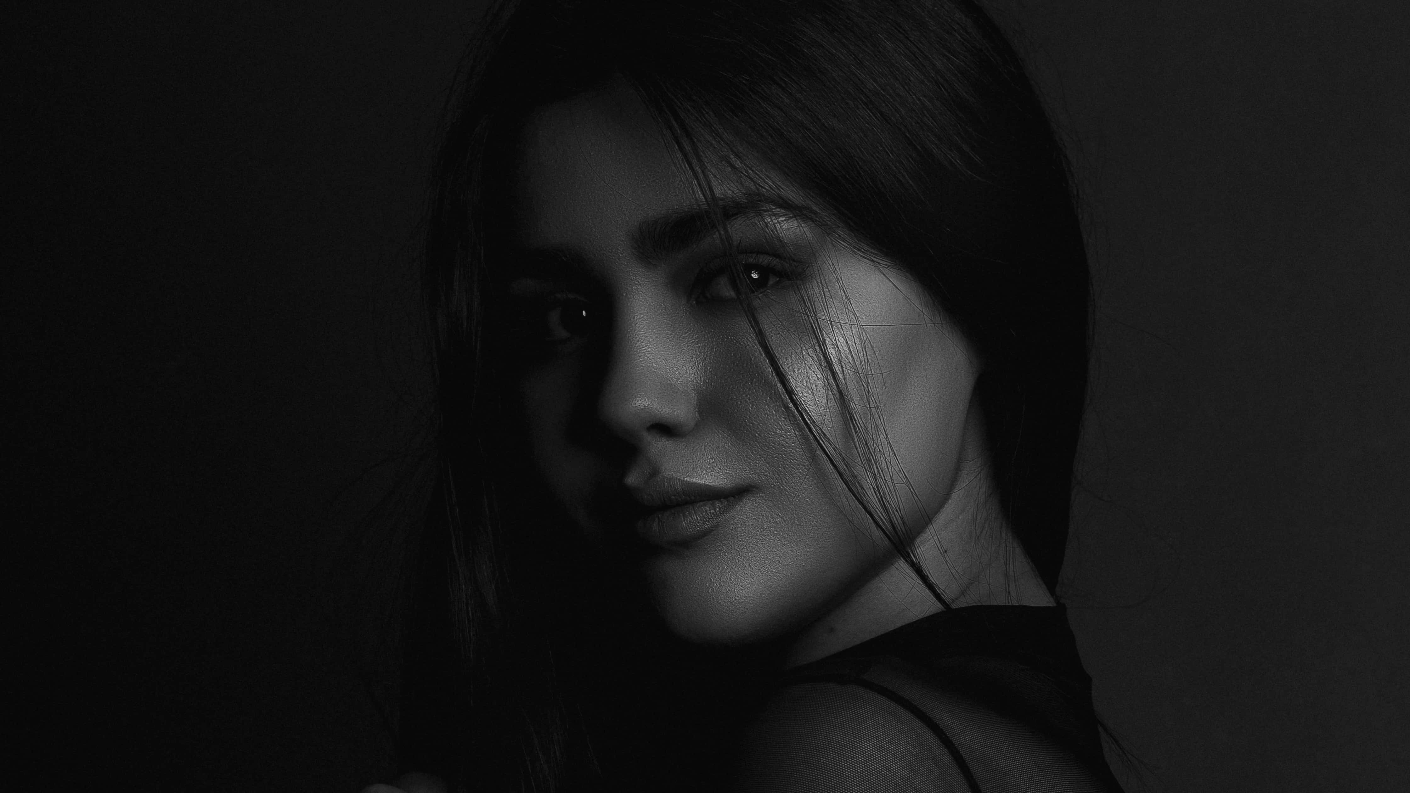 black and white portrait, woman with dark hair, gazing softly, 4K Desktop Wallpaper