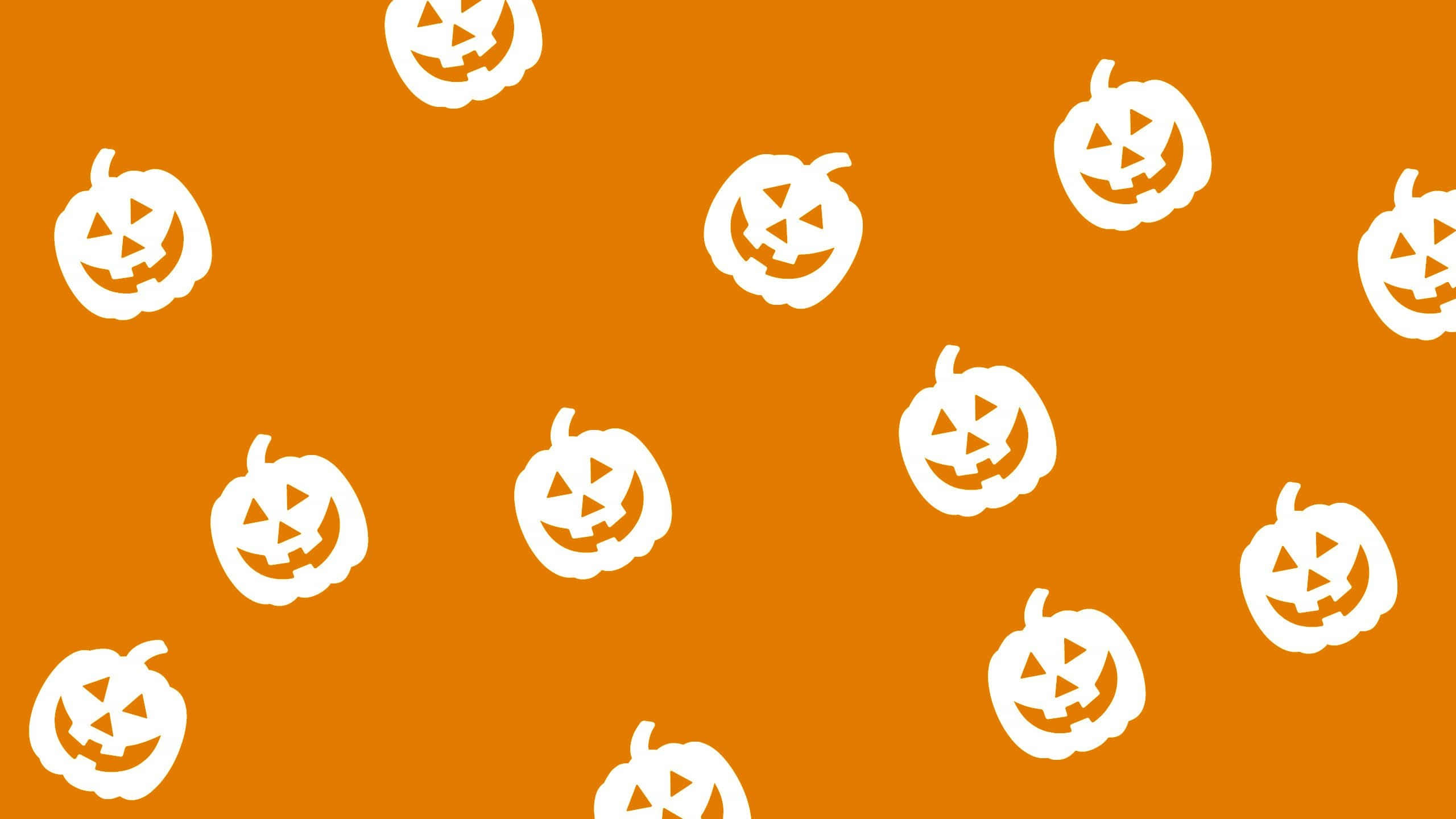 white pumpkin pattern, orange background, jack-o'-lantern silhouettes, 2K Desktop Wallpaper
