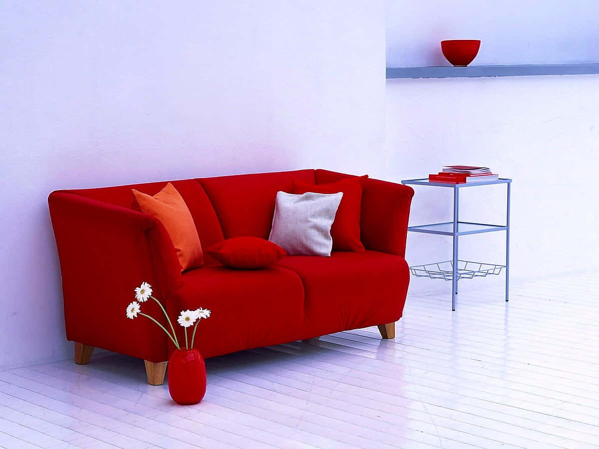minimalist red and white interior, red sofa, orange and gray pillows, SD Desktop Wallpaper