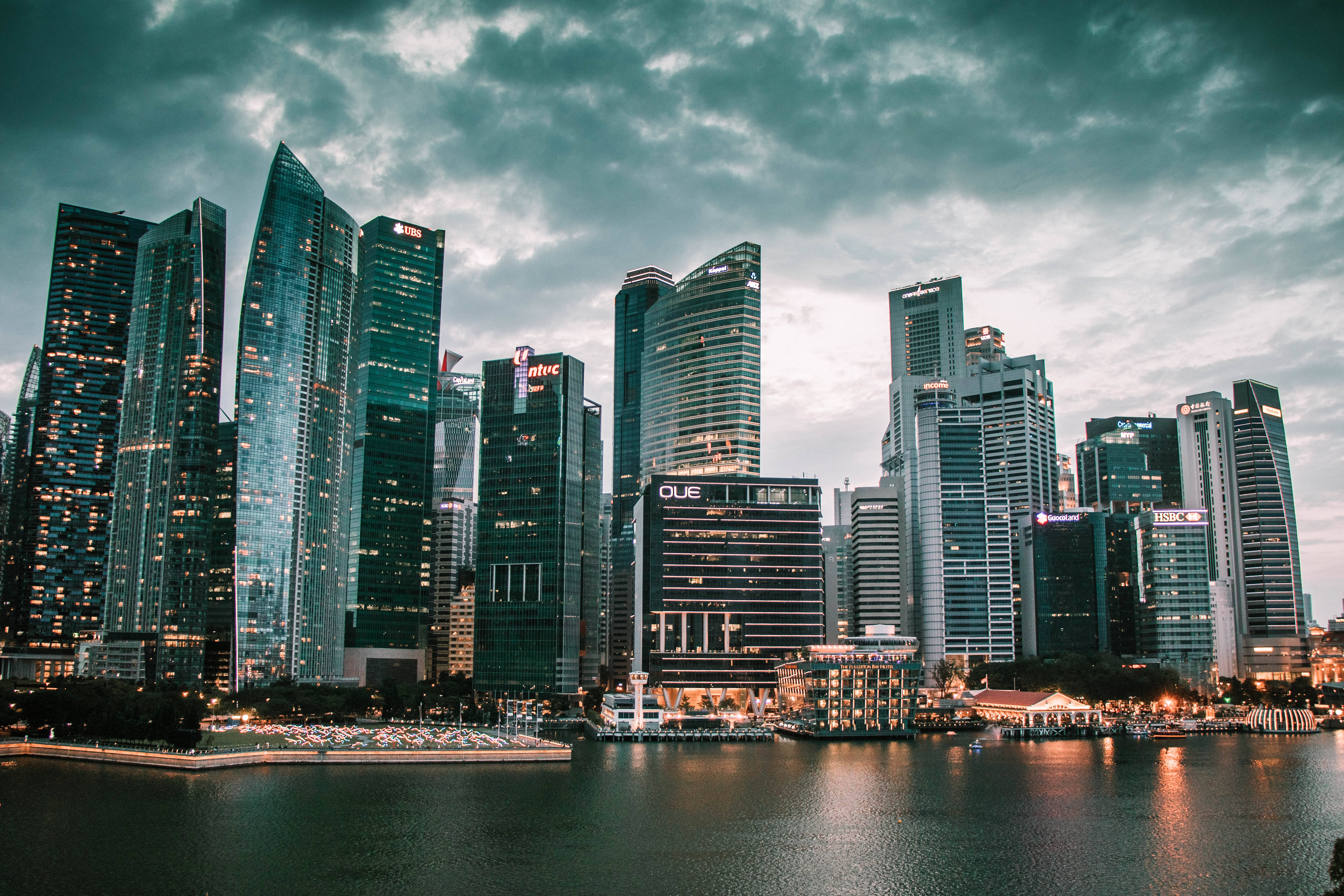 Singapore skyline, modern skyscrapers, calm water, 5K Desktop Wallpaper