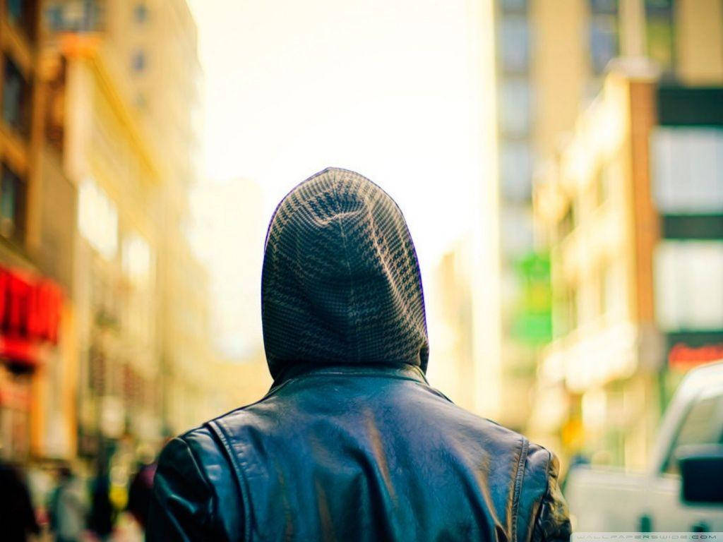hooded jacket, sunlit city street, warm tones, SD Desktop Wallpaper