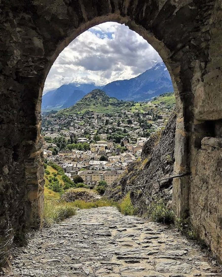 Sion Switzerland, stone archway, cobblestone path, SD Phone Wallpaper