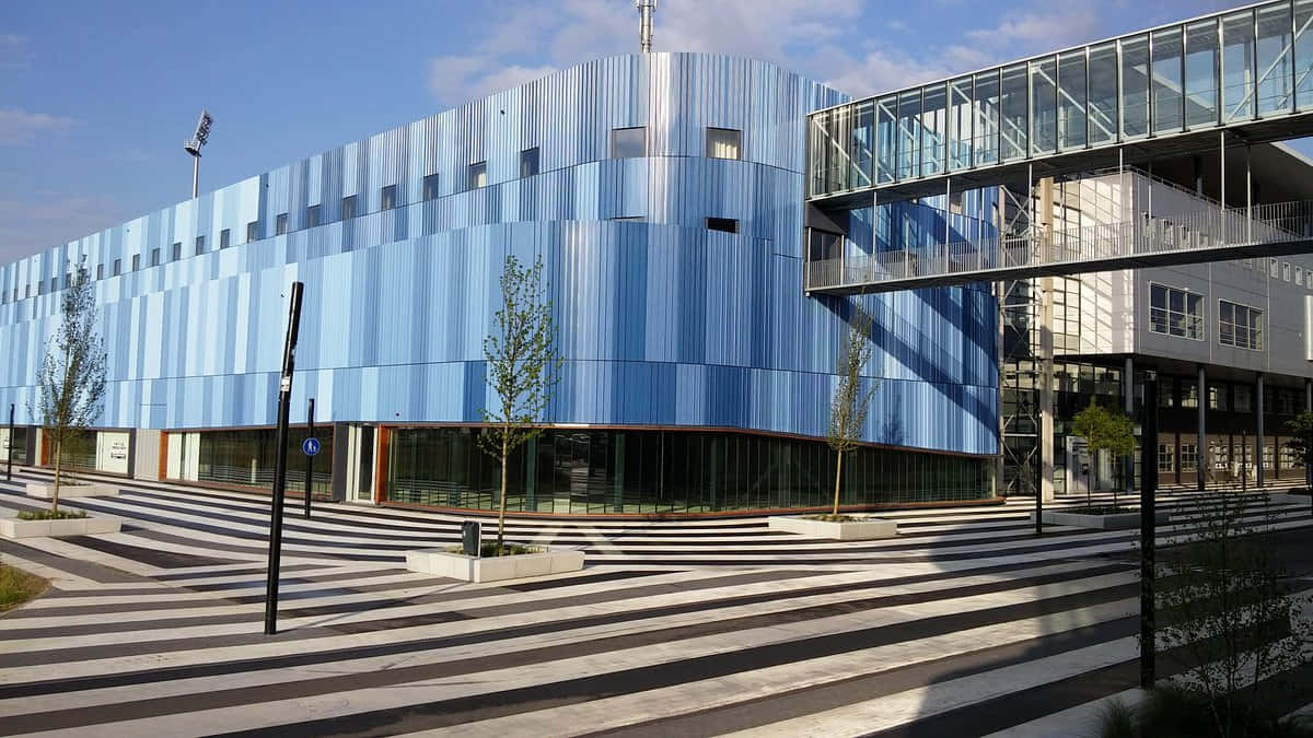 Sittard, modern blue corrugated metal building, glass walkway, SD Desktop Wallpaper
