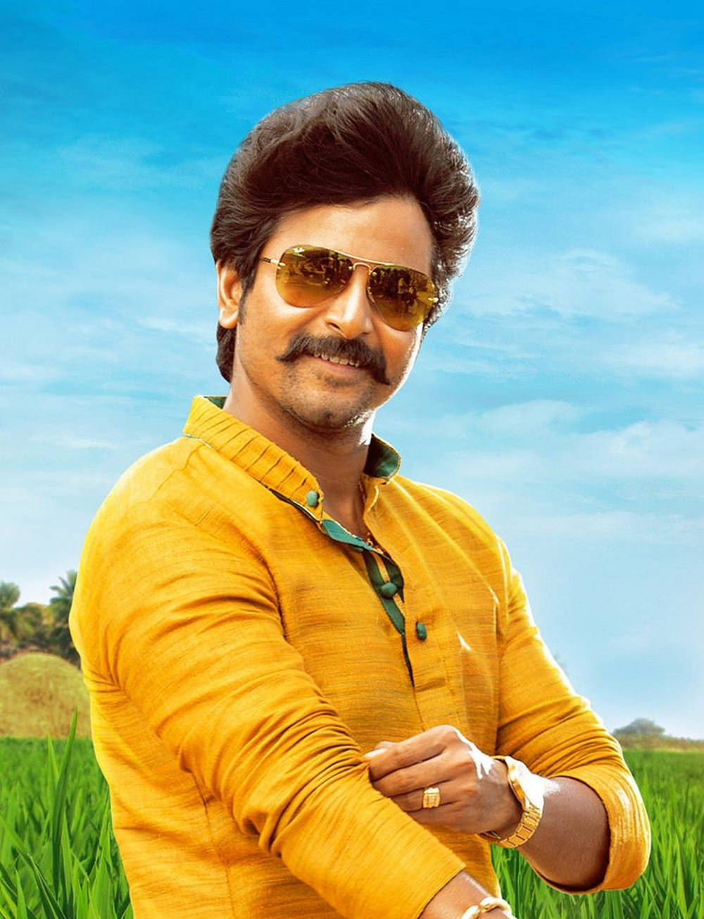 Sivakarthikeyan, yellow shirt, green field, HD Phone Wallpaper
