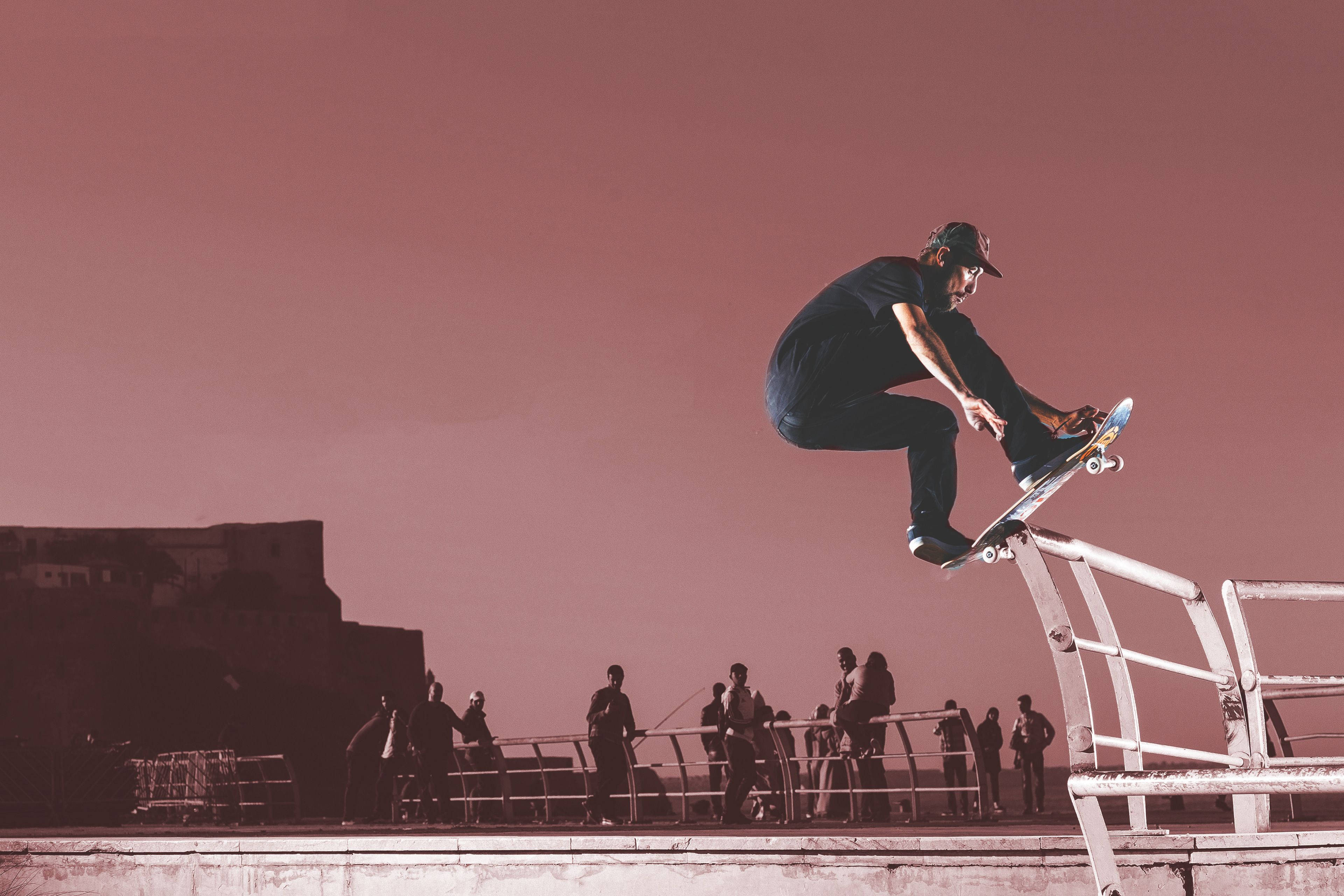 skateboarding rail trick, skateboard rail, dusky pink sky, 4K Desktop Wallpaper