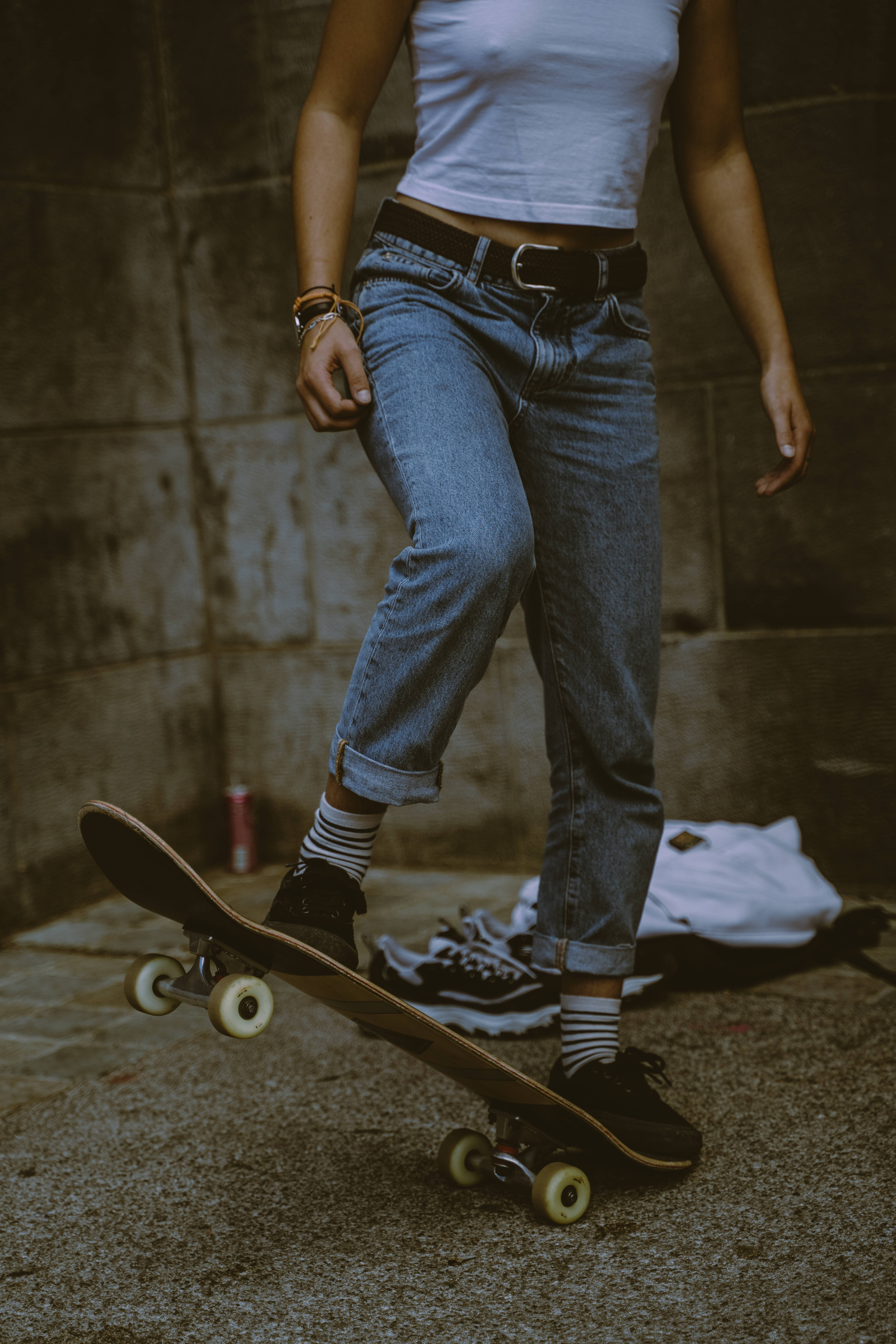 skateboard, textured concrete wall, rolled jeans, 5K Phone Wallpaper