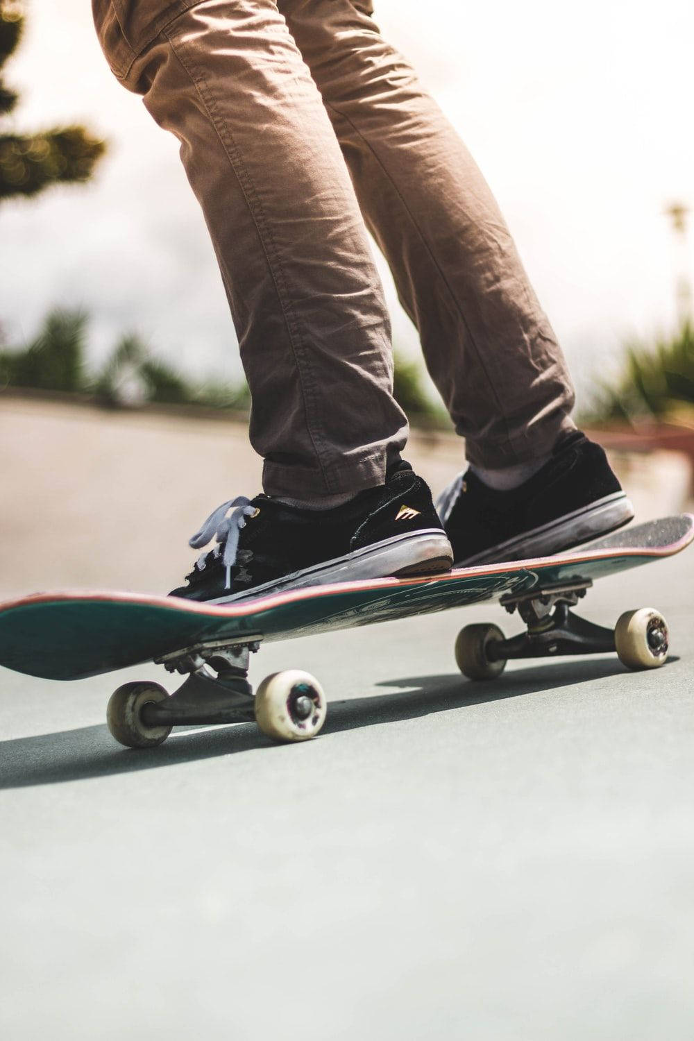 black sneakers, skateboard, paved surface, HD Phone Wallpaper