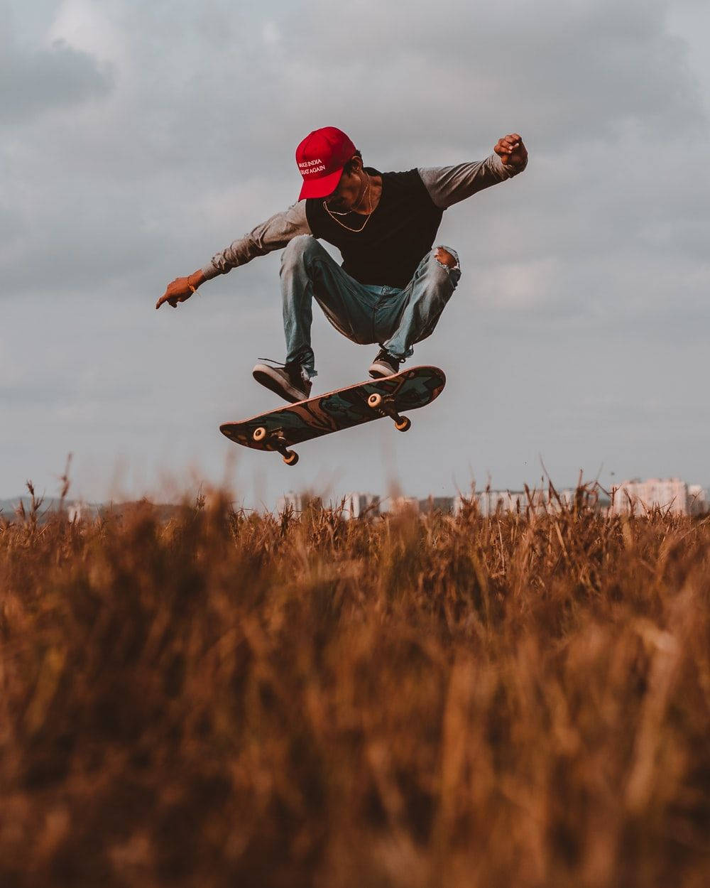 wheat field, mid-air, skateboarder, SD Phone Wallpaper