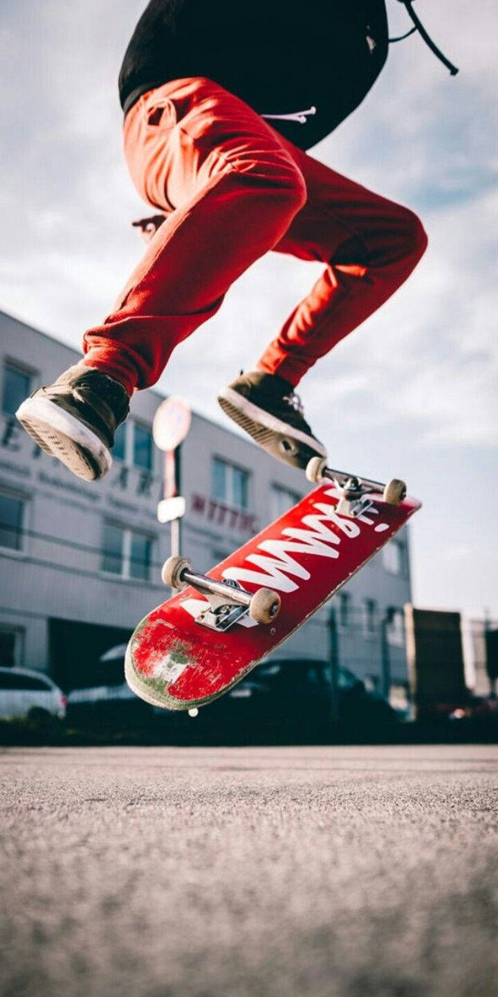 red skateboard, red pants, black shirt, HD Phone Wallpaper