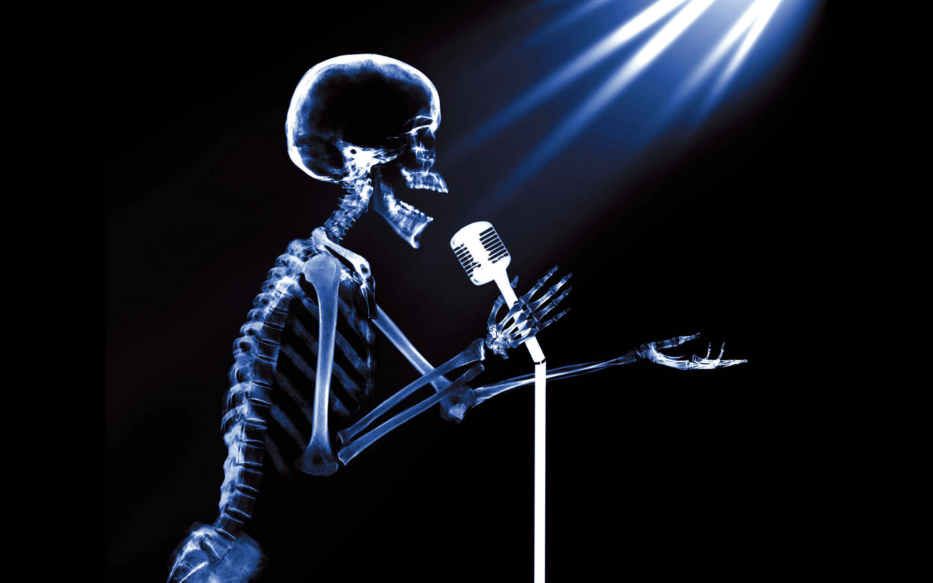 singing skeleton meme, glowing blue skeleton, vintage microphone, Full HD Desktop Wallpaper