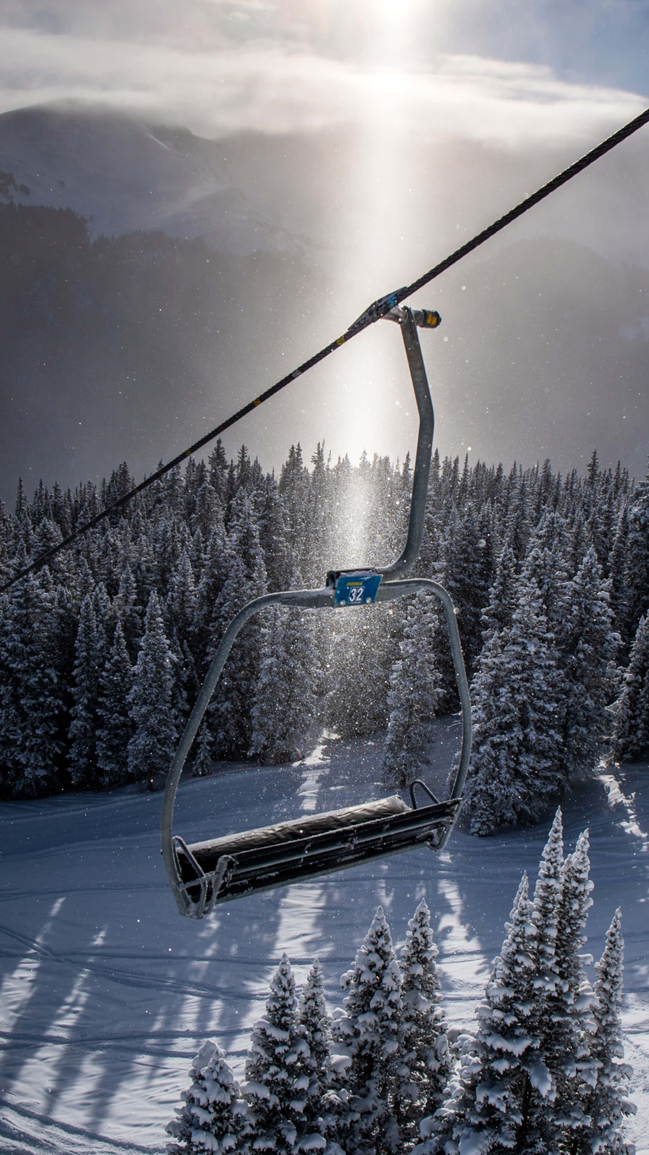 Ski Mountain, ski lift chair, sunlit winter forest, 4K Phone Wallpaper