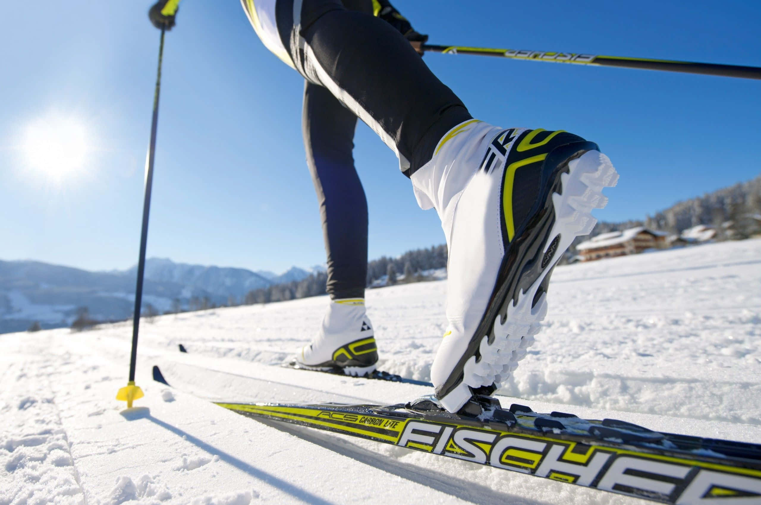 skier, snowy terrain, bright sun, 2K Desktop Wallpaper