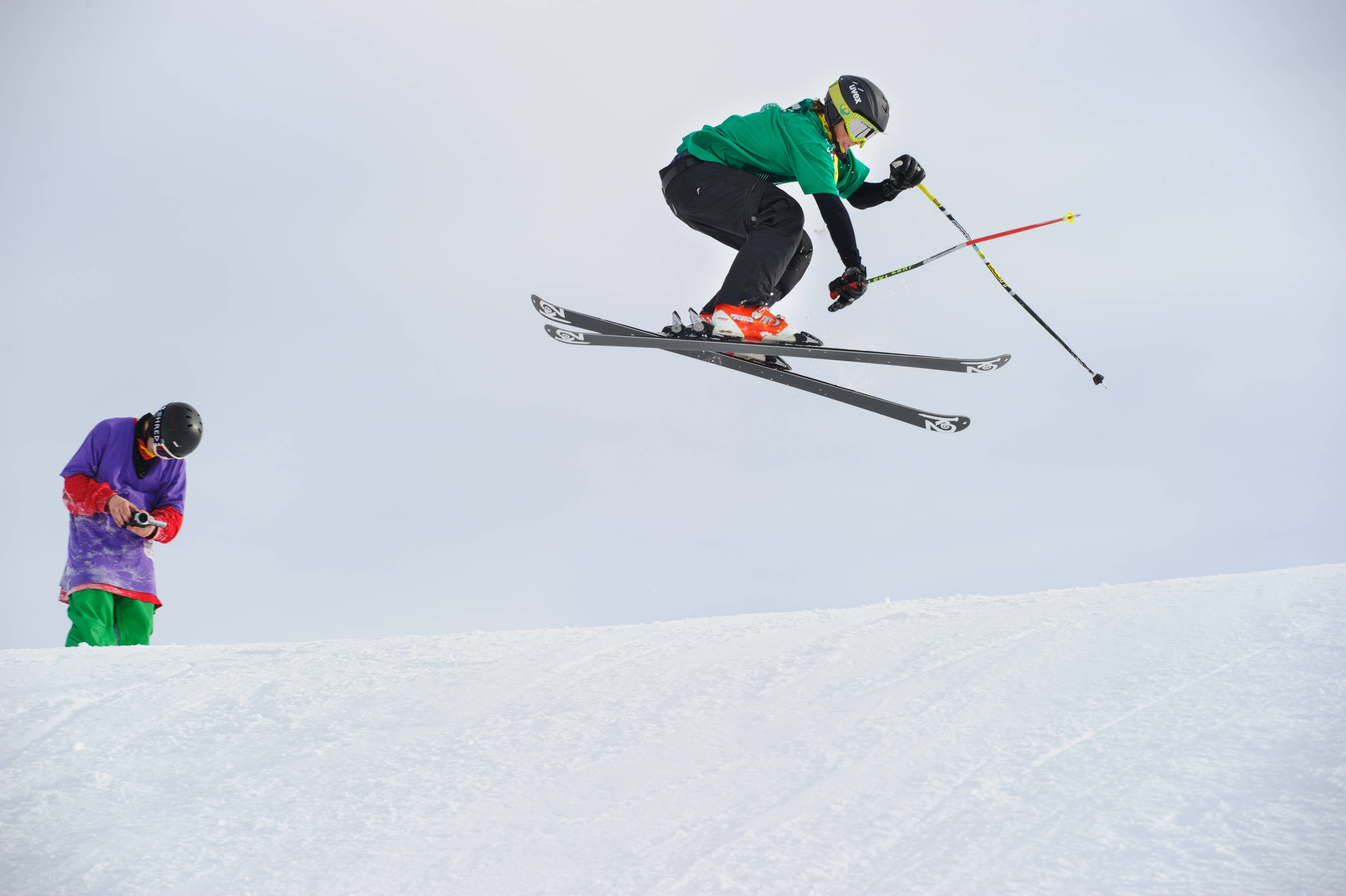 freestyle skiing, green jacket, snowy slope, 4K Desktop Wallpaper