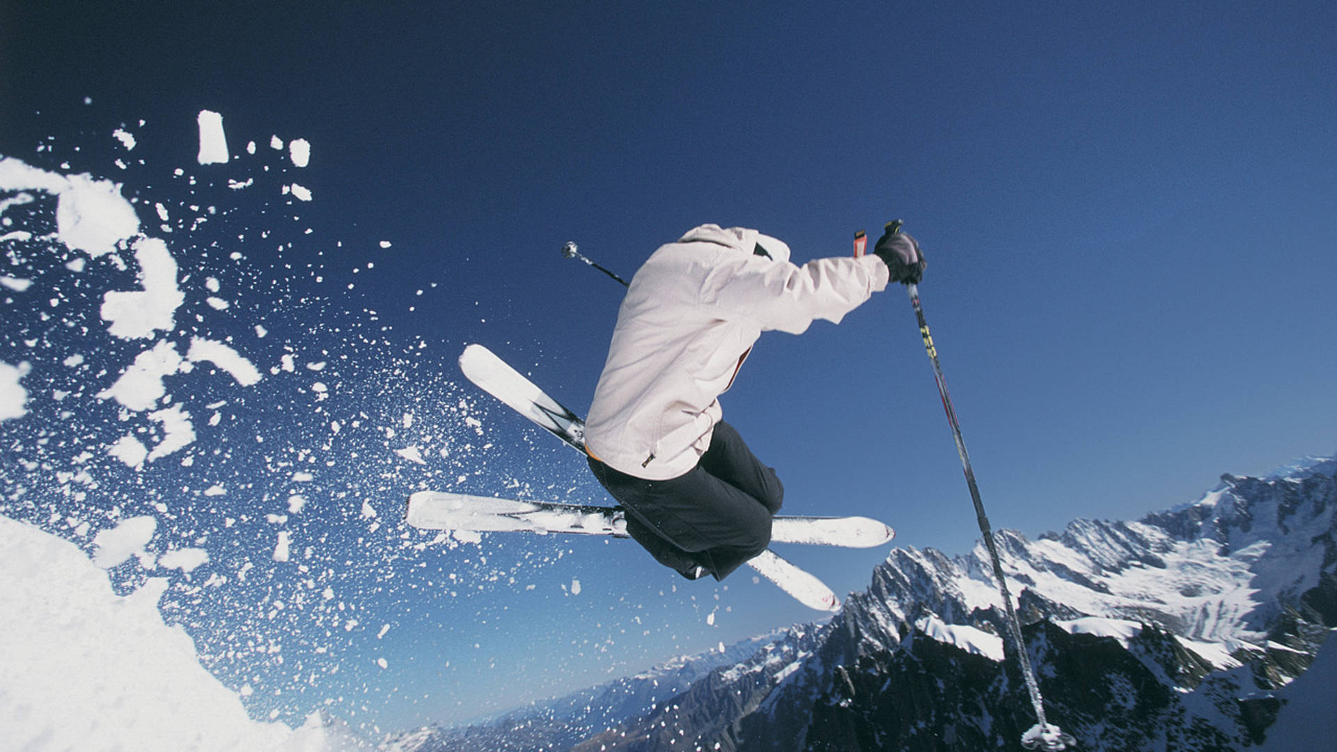 Skiing, snowy peaks, crisp blue air, Full HD Desktop Wallpaper