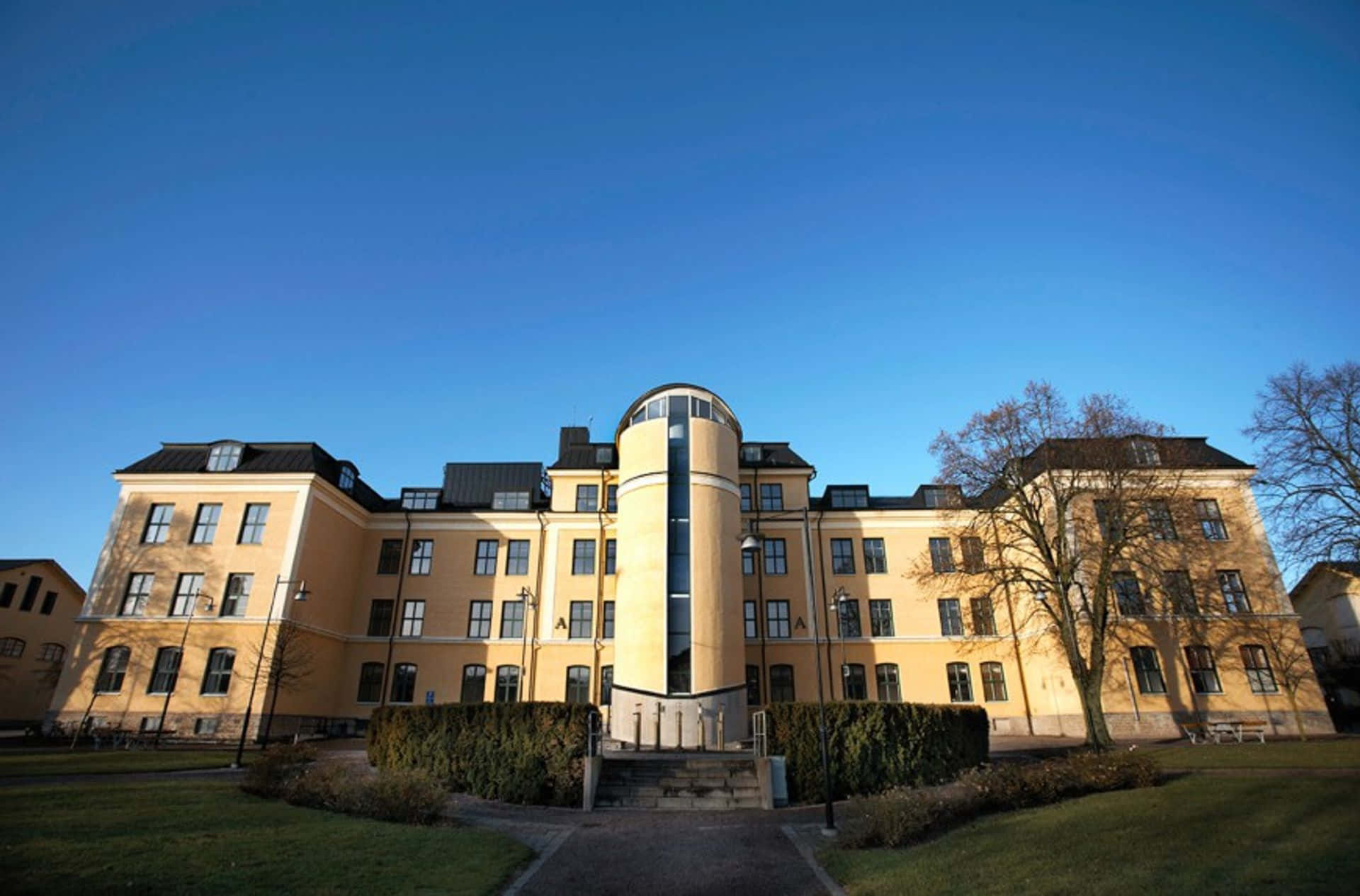 Skövde, yellow university building, central glass tower, Full HD Desktop Wallpaper
