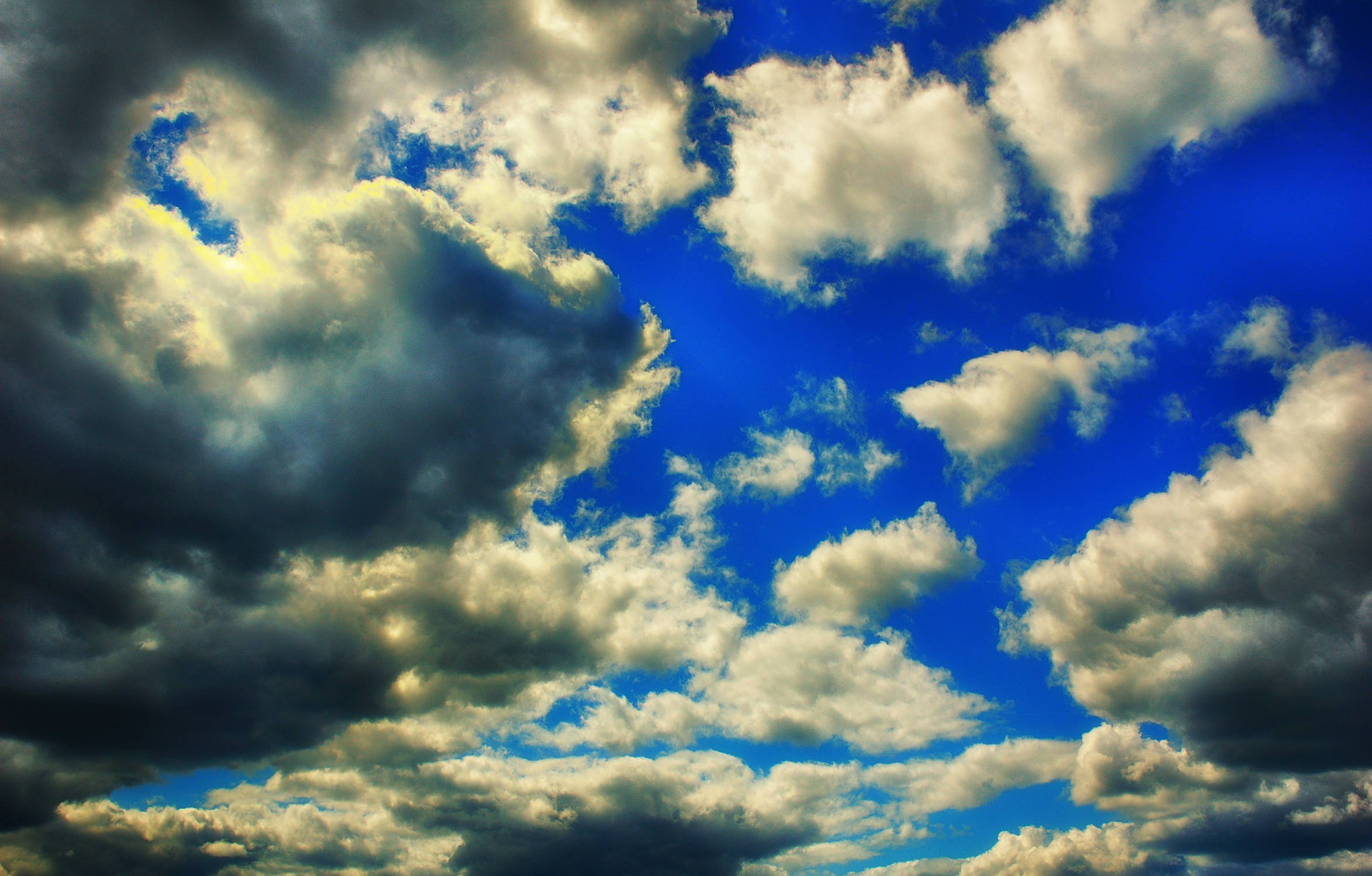 saturated clouds, vivid blue sky, golden edges, Full HD Desktop Wallpaper