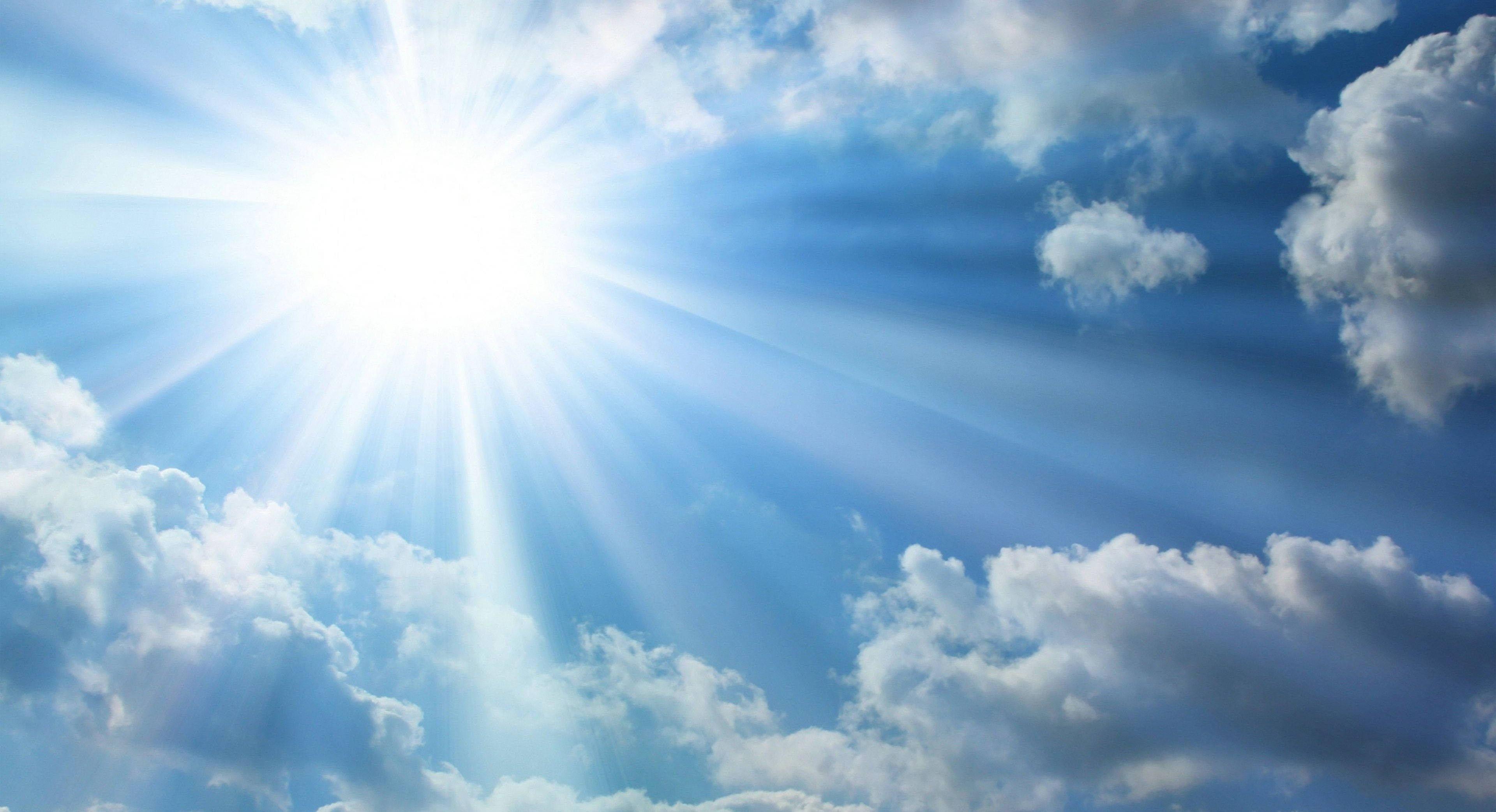 sunburst, fluffy white clouds, vibrant blue sky, 4K Desktop Wallpaper