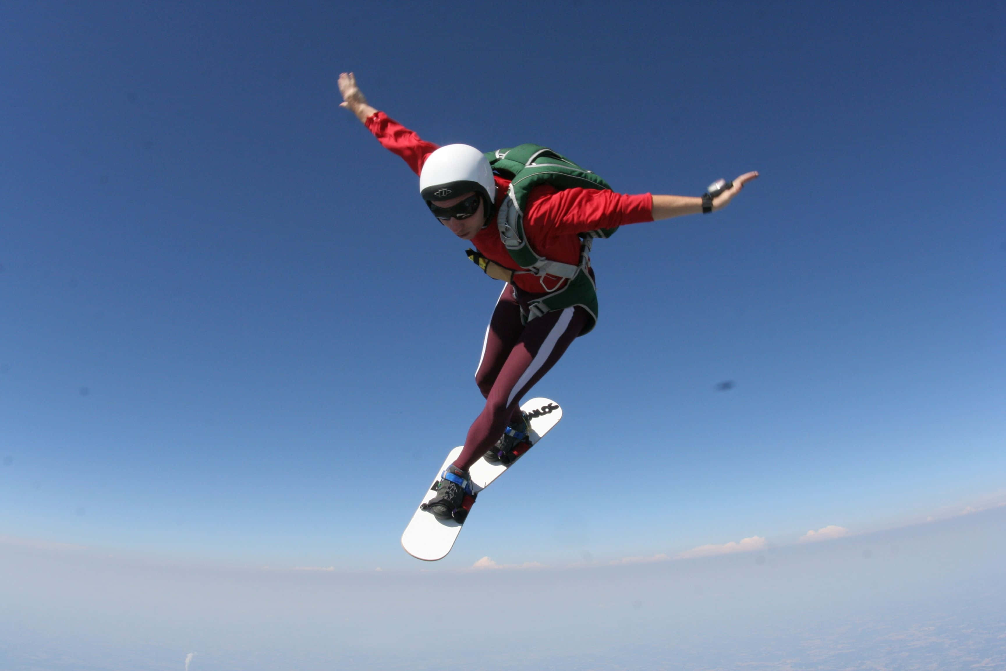 skydiving, red gear, white helmet, 2K Desktop Wallpaper
