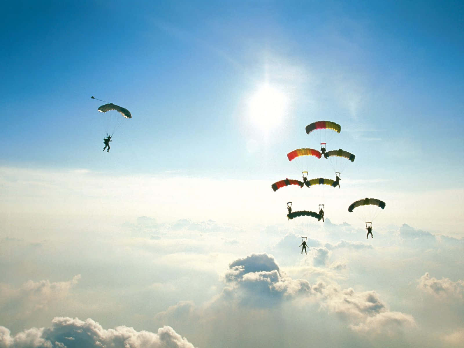 organized mass jump skydiving, colorful parachutes, bright blue sky, HD Desktop Wallpaper