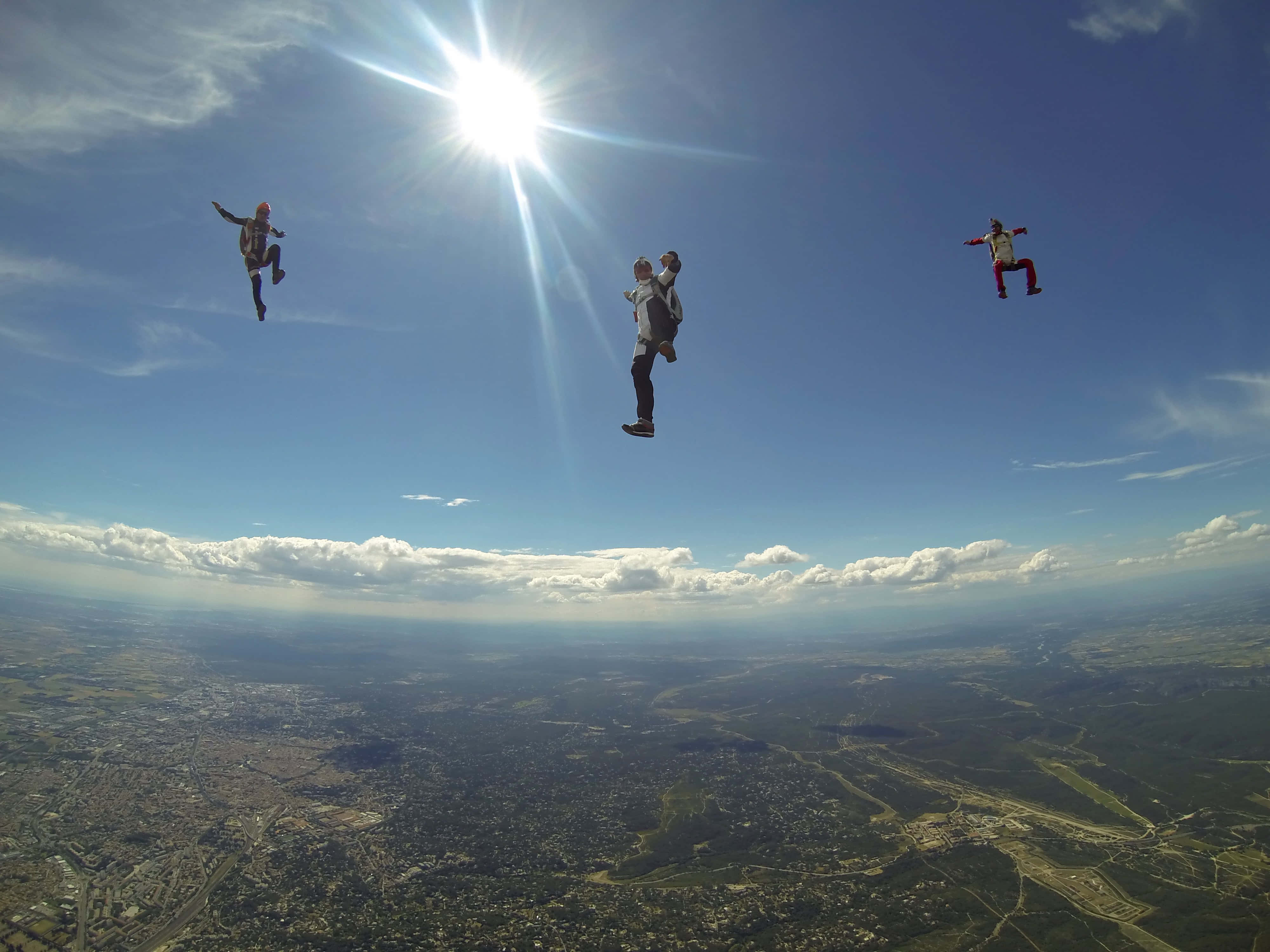 skydiving, blazing sun, vast blue sky, 4K Desktop Wallpaper