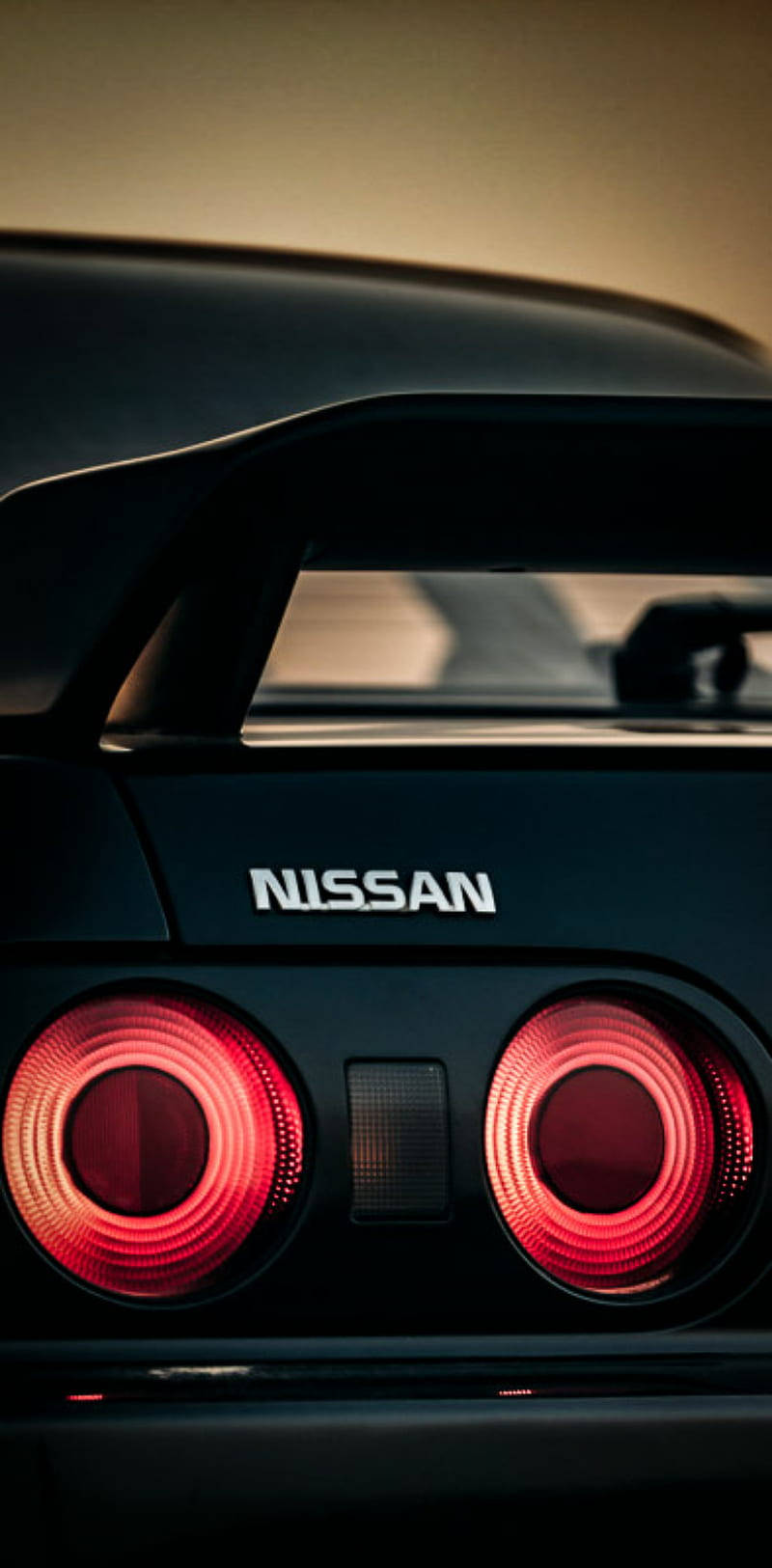 Skyline R32, black Nissan sports car, glowing red circular taillights, HD Phone Wallpaper