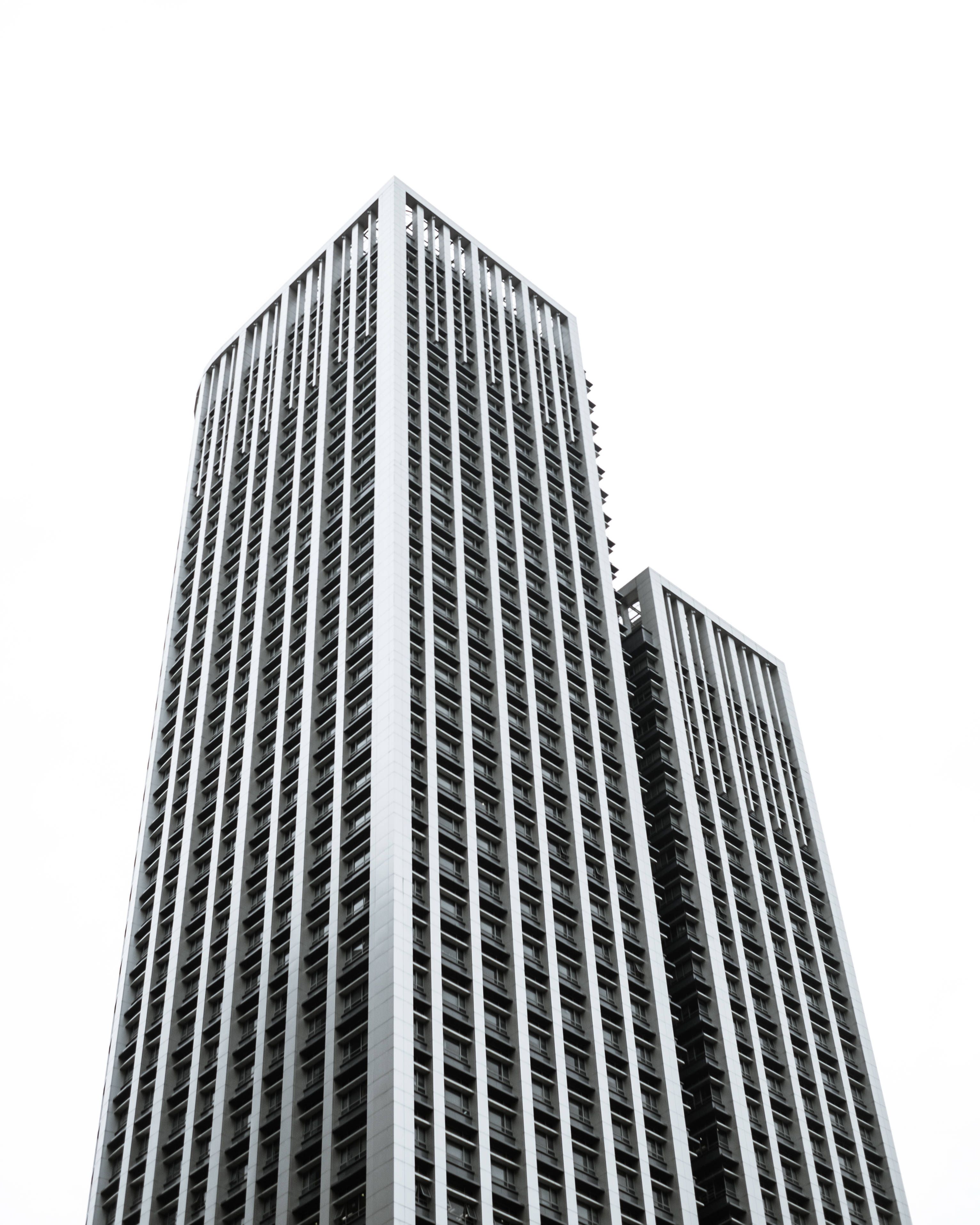 black and white skyscraper, towering skyscrapers, stark white sky, 2K Phone Wallpaper