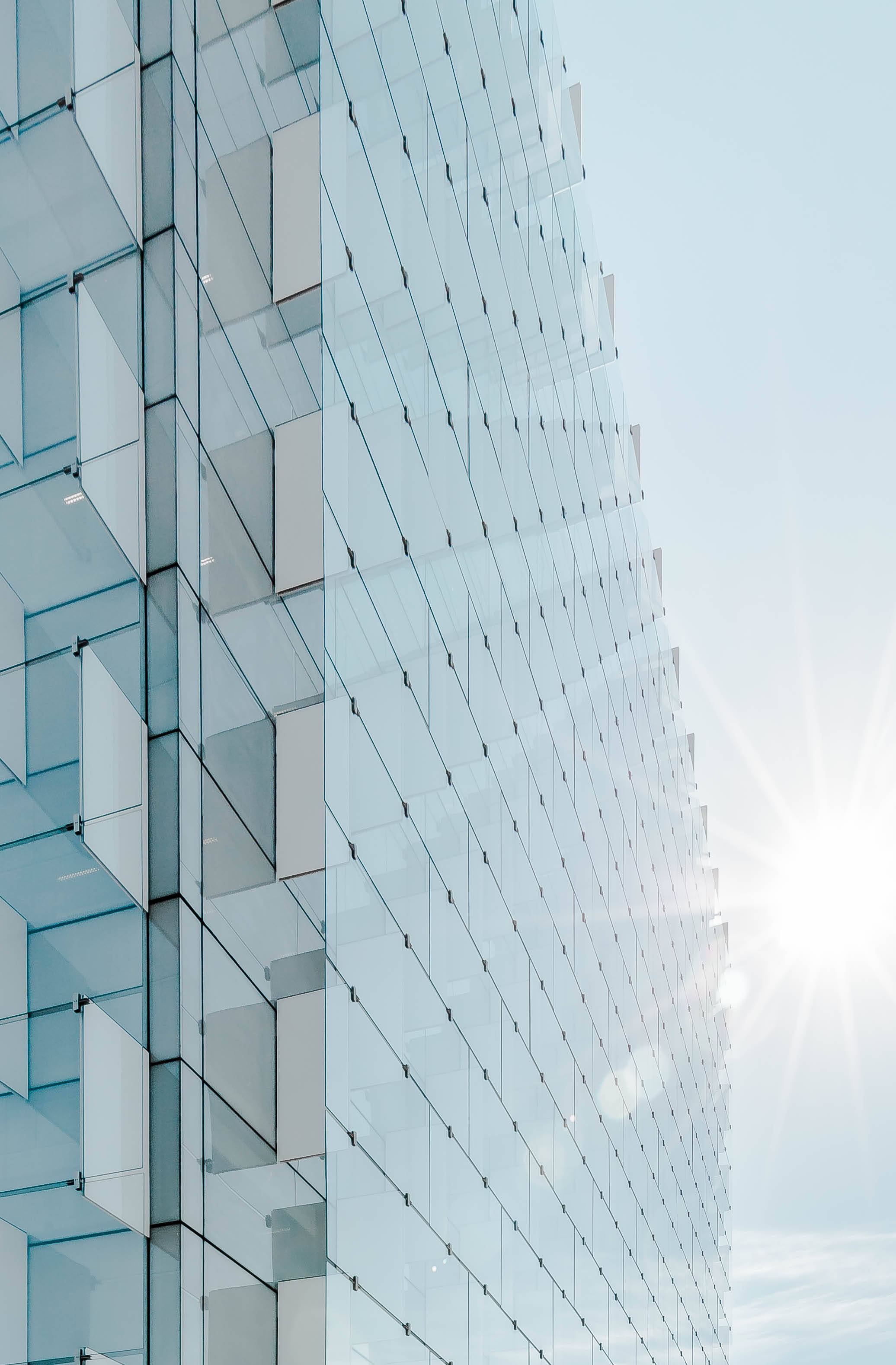glass skyscraper, bright sun, lens flares, 2K Phone Wallpaper