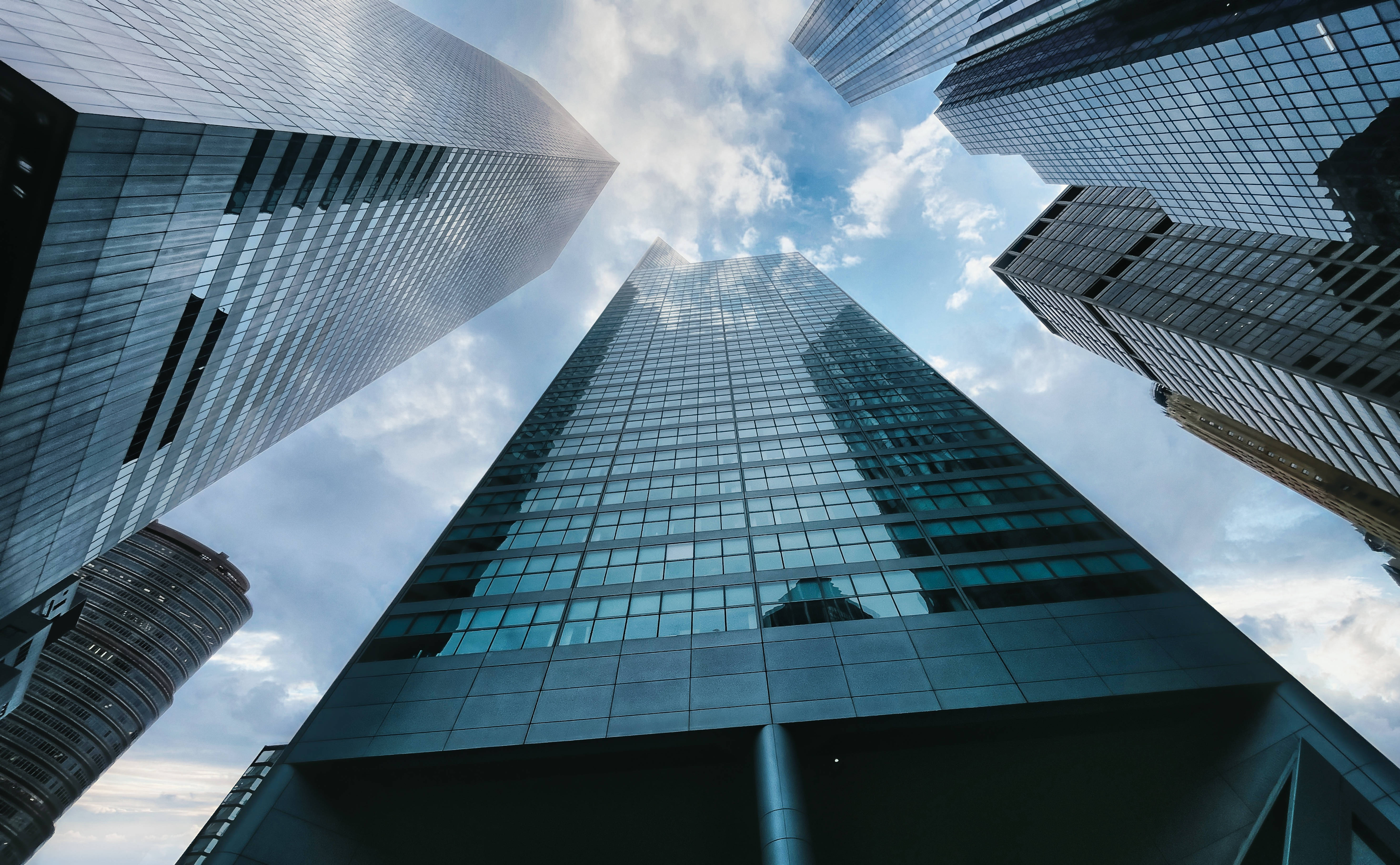 mirrored skyscrapers, low angle, bright blue sky, 5K Desktop Wallpaper
