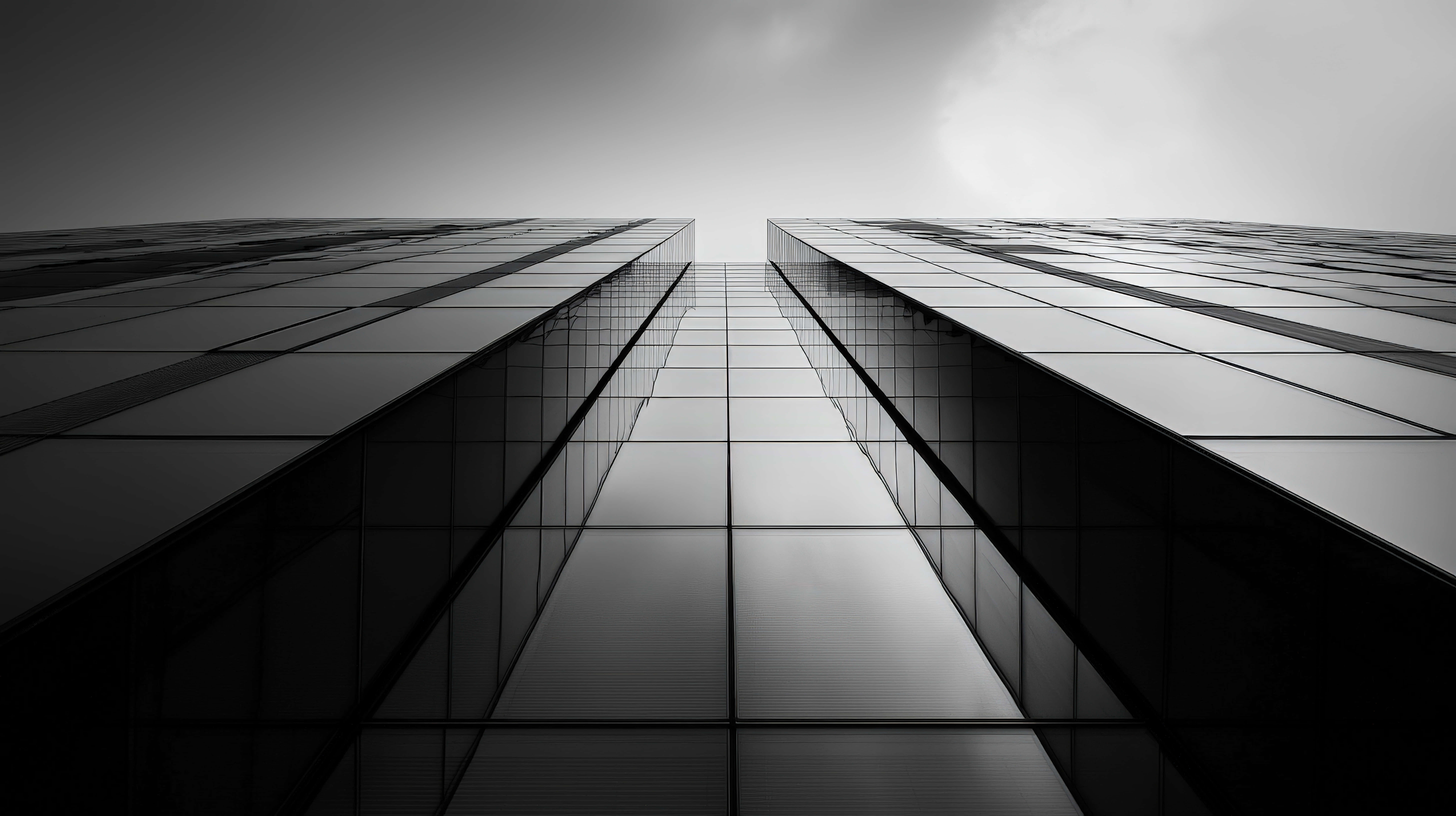 black and white skyscraper, reflective glass panels, dramatic perspective, 8K Desktop Wallpaper