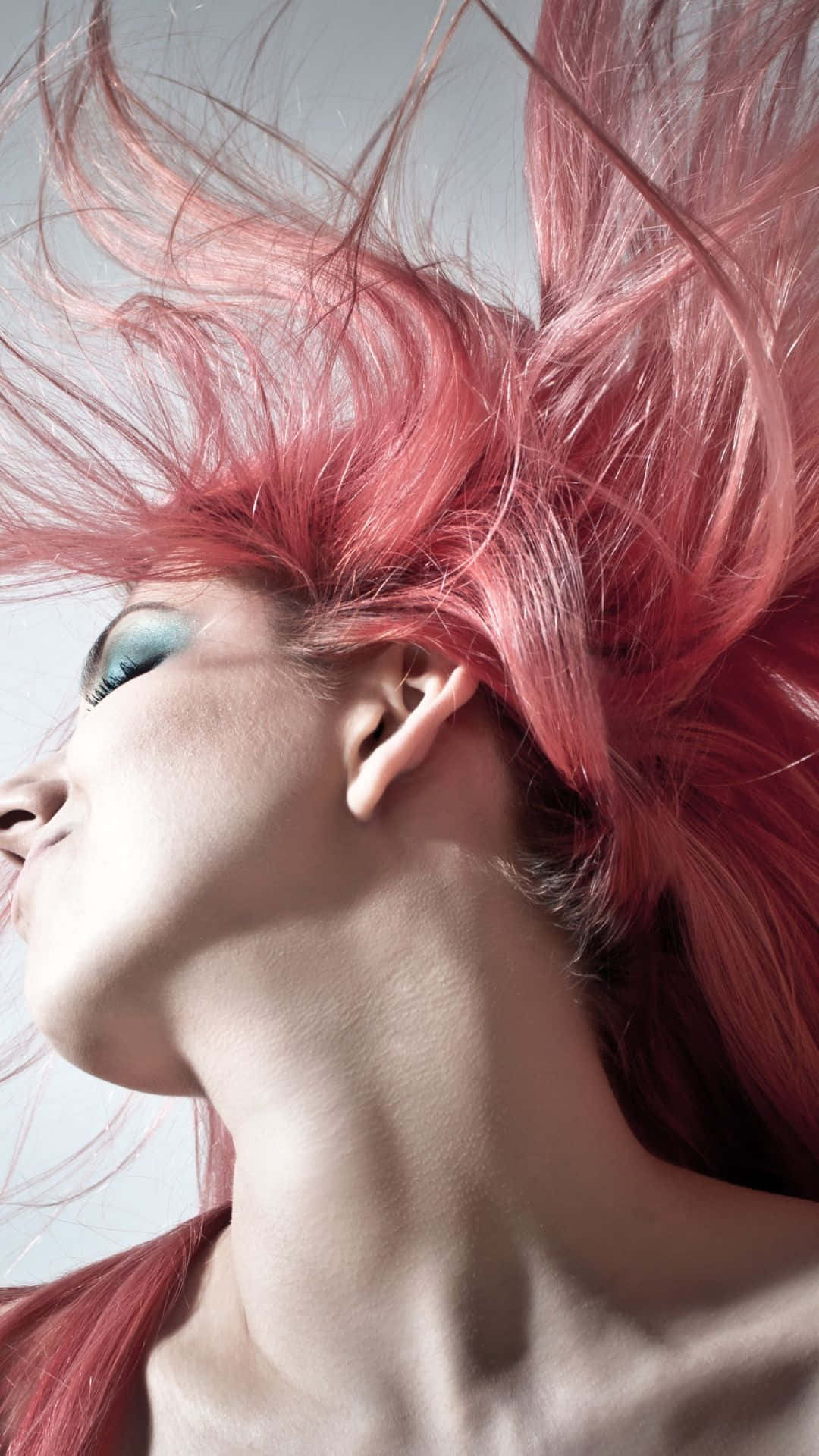 vibrant pink hair, striking blue eyes, soft gray background, Full HD Phone Wallpaper