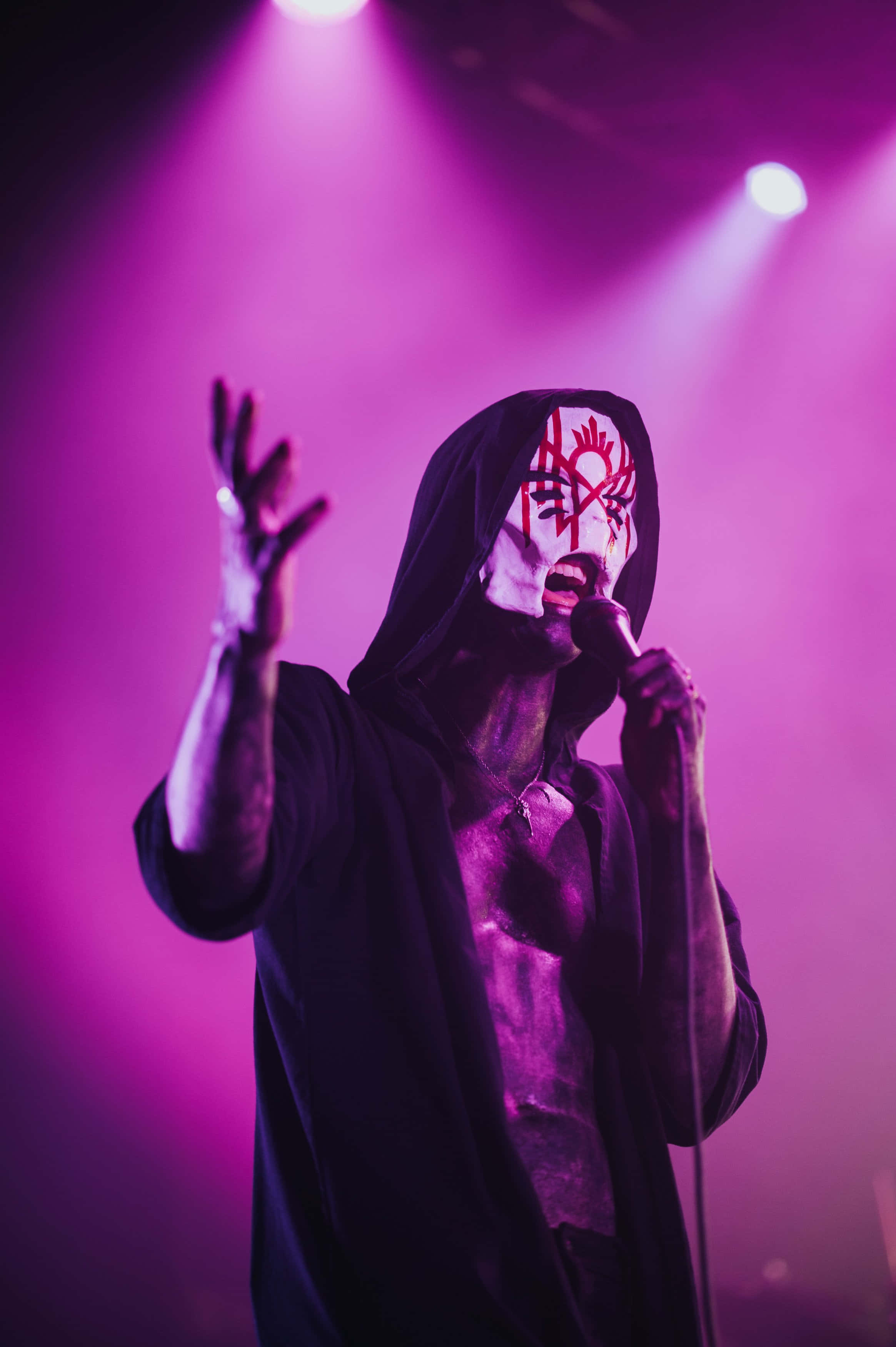 purple stage lights, hooded black robe, white face paint, 2K Phone Wallpaper
