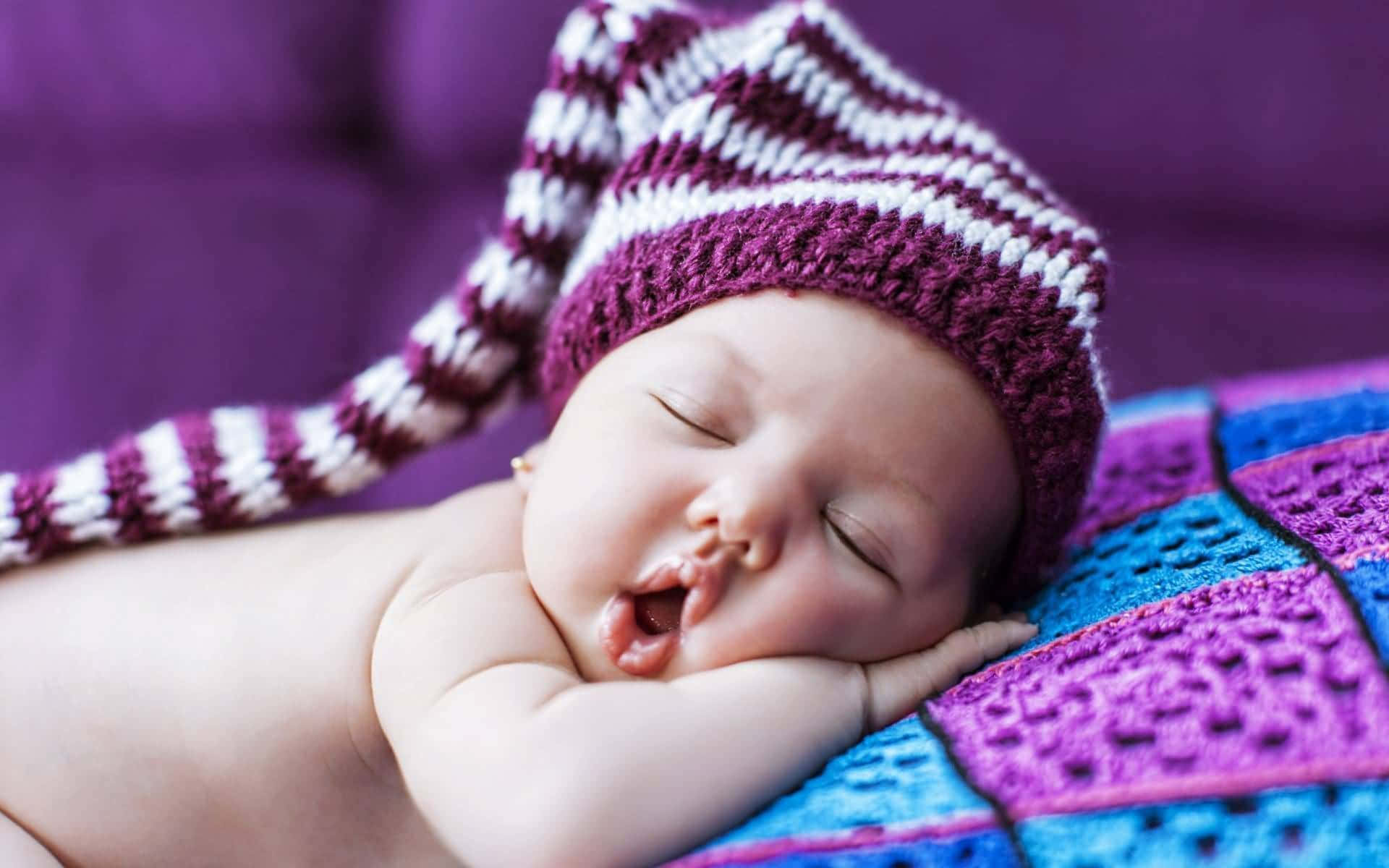 newborn baby, purple and white striped knit hat, colorful crocheted blanket, Full HD Desktop Wallpaper