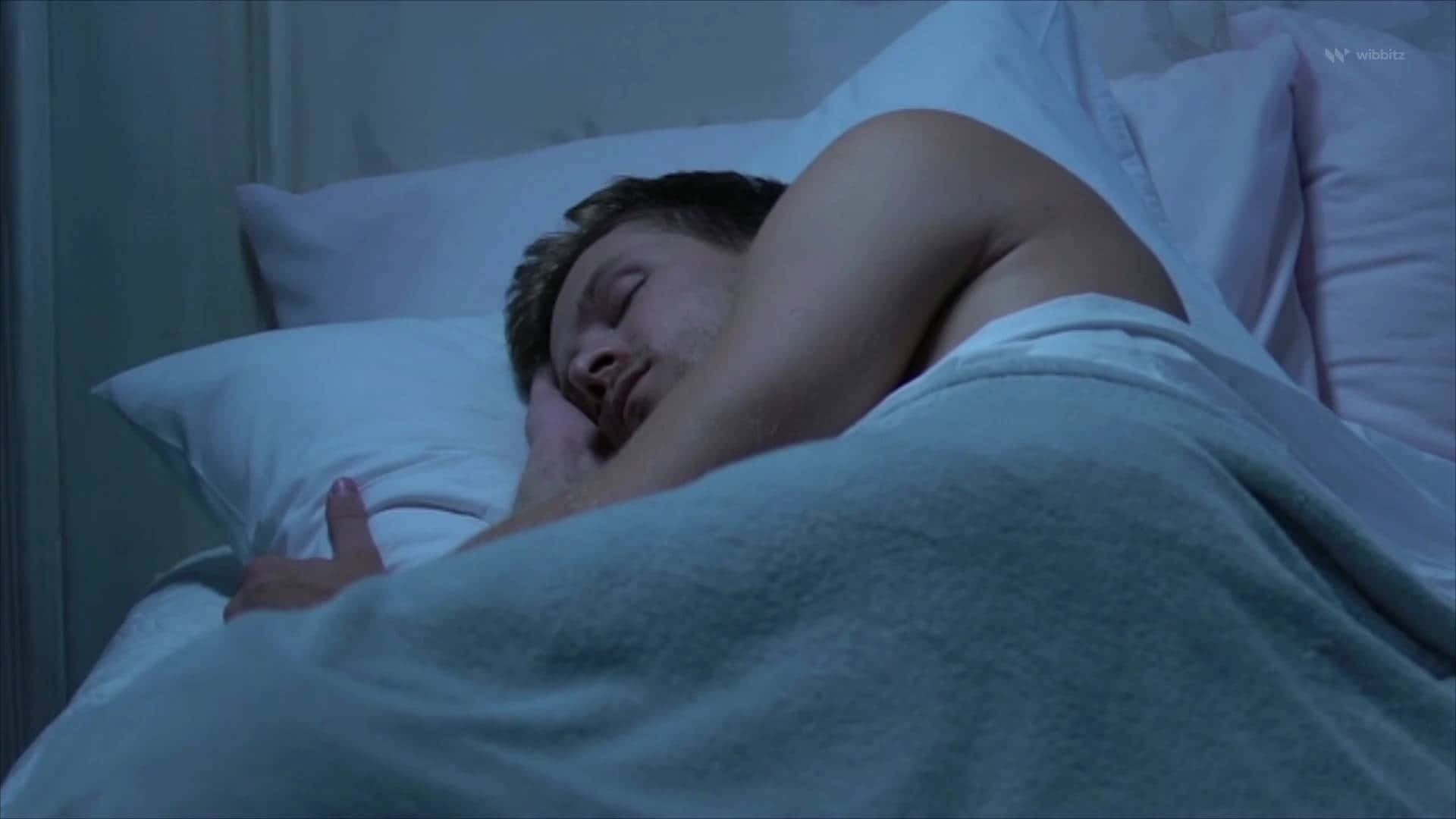 man, blue-toned blankets, dimly lit bedroom, Full HD Desktop Wallpaper