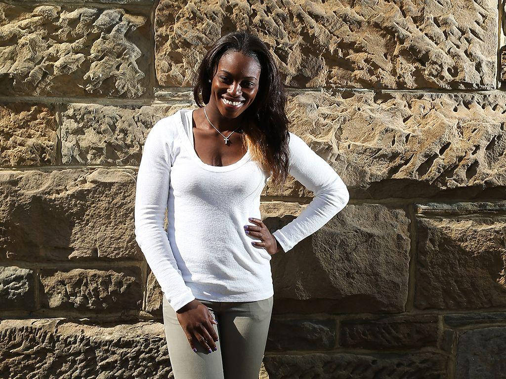 Sloane Stephens, white long-sleeve shirt, textured stone wall, SD Desktop Wallpaper