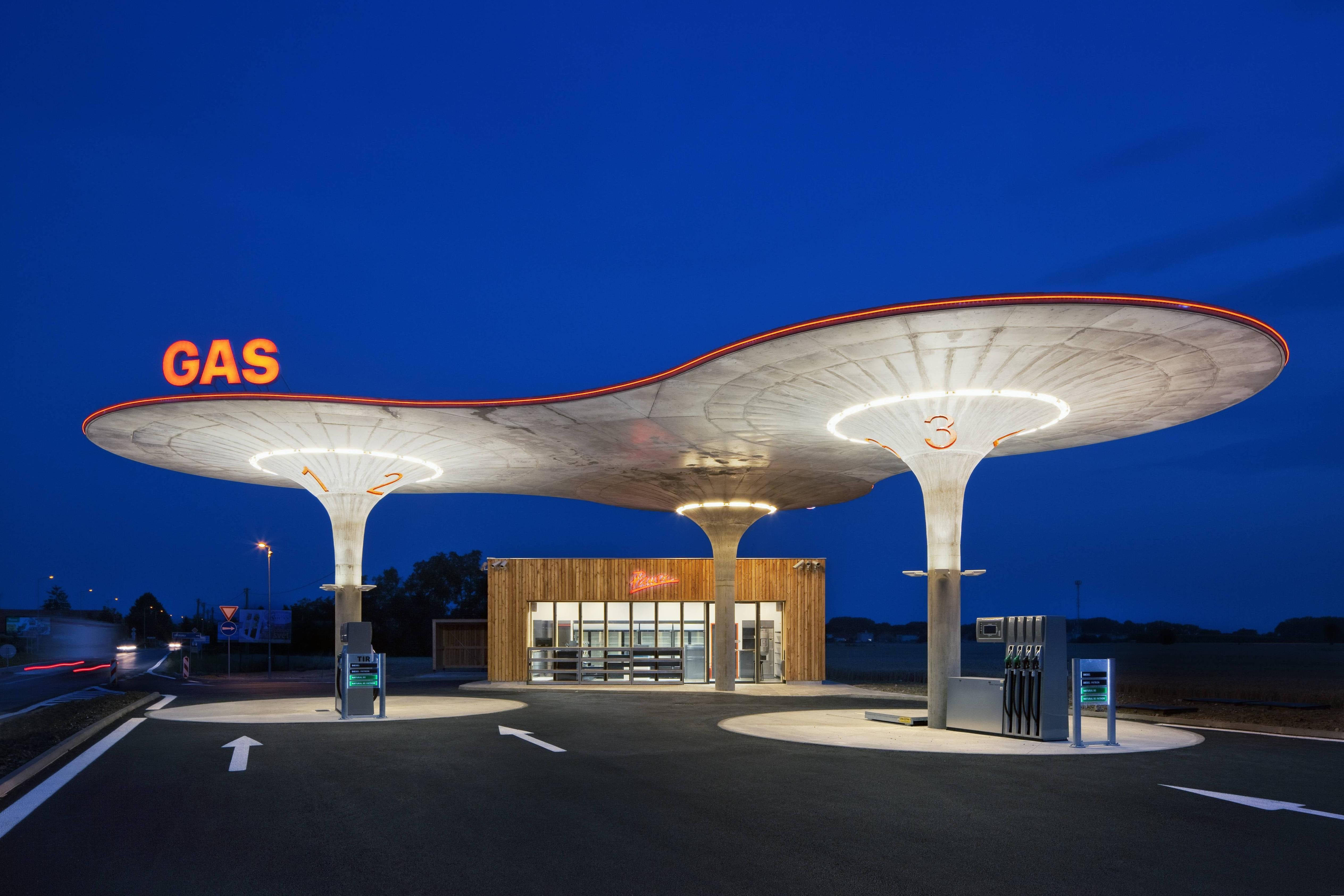 Slovakia, futuristic gas station, glowing orange 'GAS' sign, 4K Desktop Wallpaper