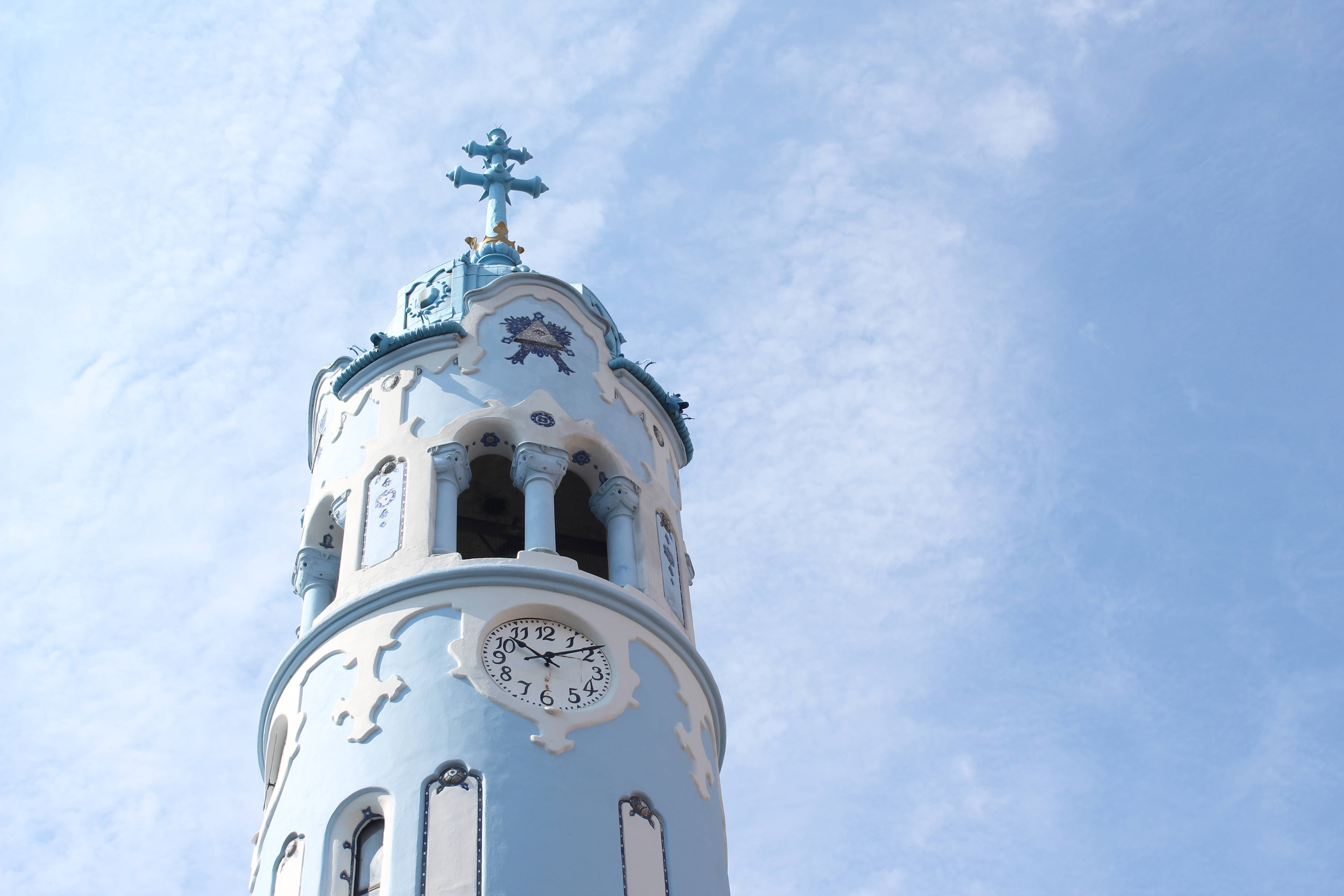 church in Slovakia, light blue ornate clock tower, cross, 5K Desktop Wallpaper