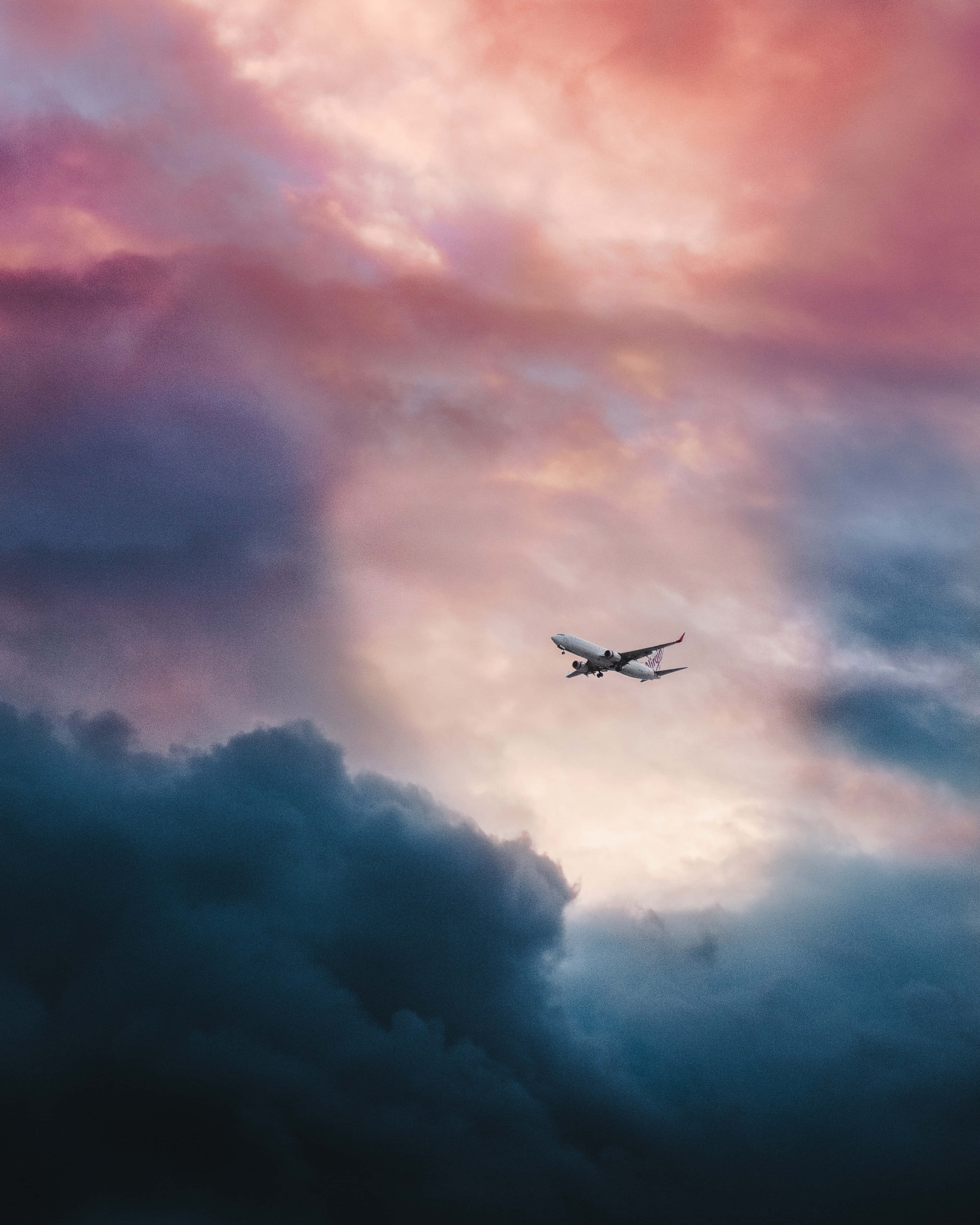 distant small airplane, pink purple and blue clouds, twilight, 4K Phone Wallpaper