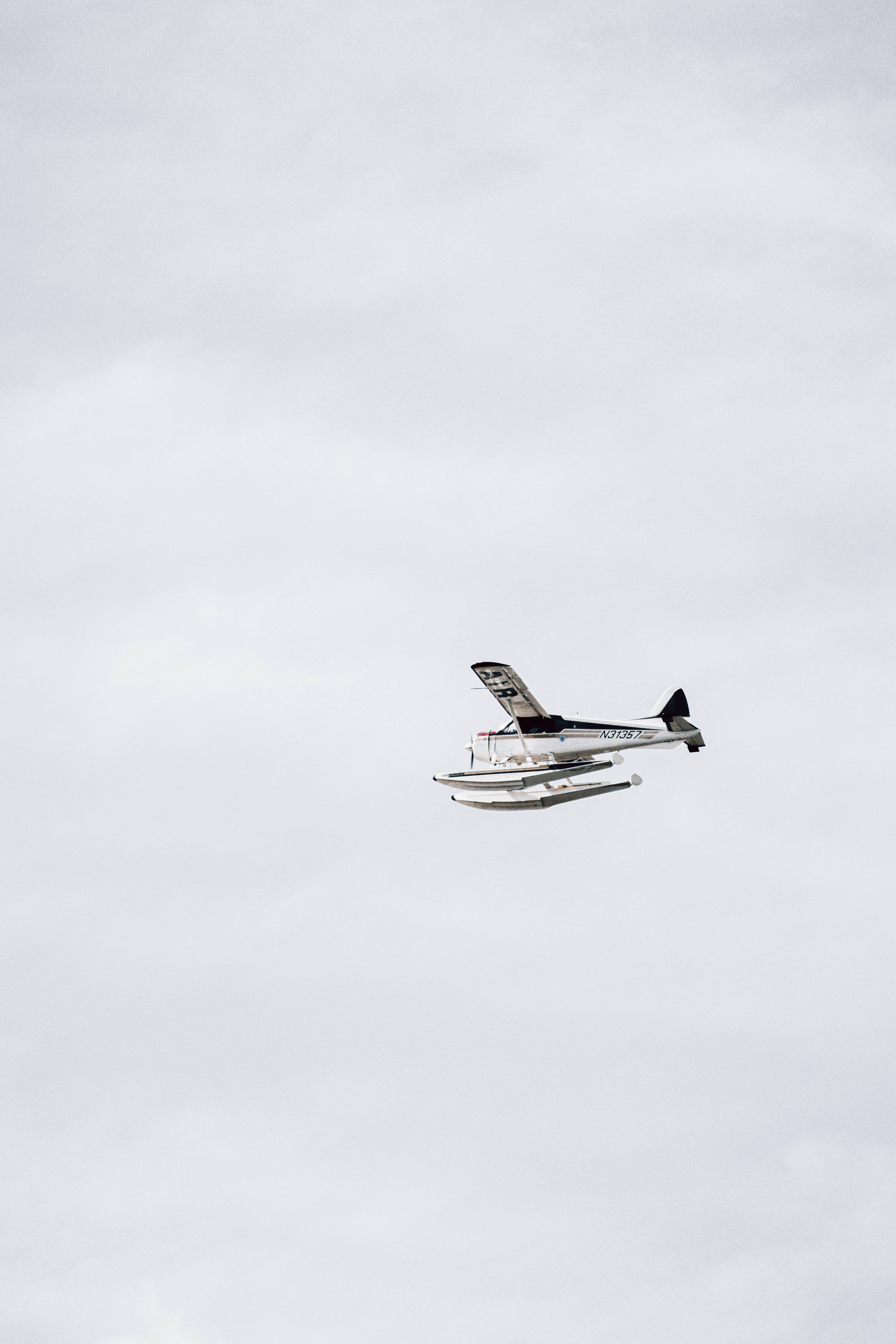 white seaplane, black accents, overcast sky, 5K Phone Wallpaper