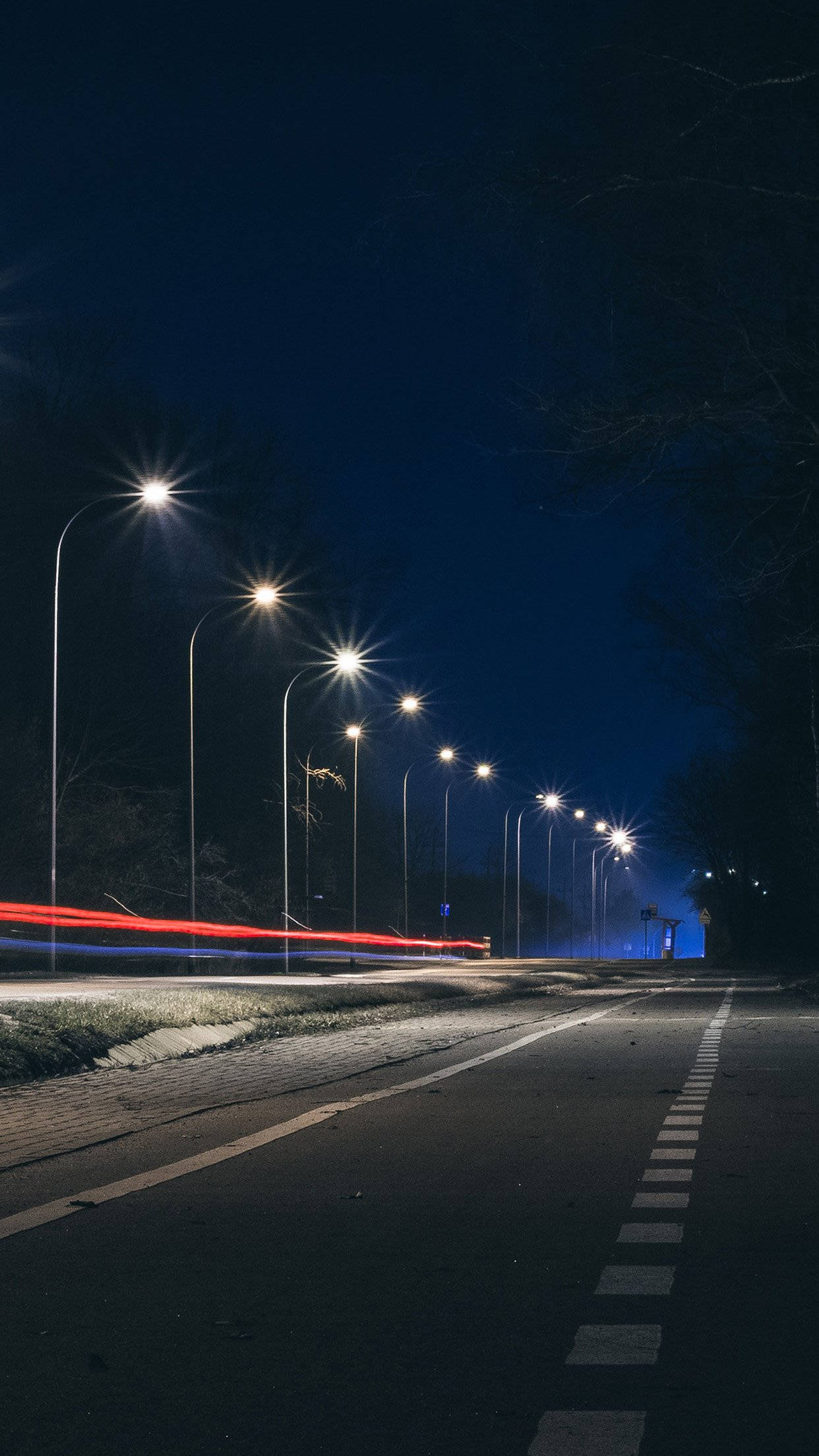 long exposure night shot, quiet road, glowing streetlights, Full HD Phone Wallpaper