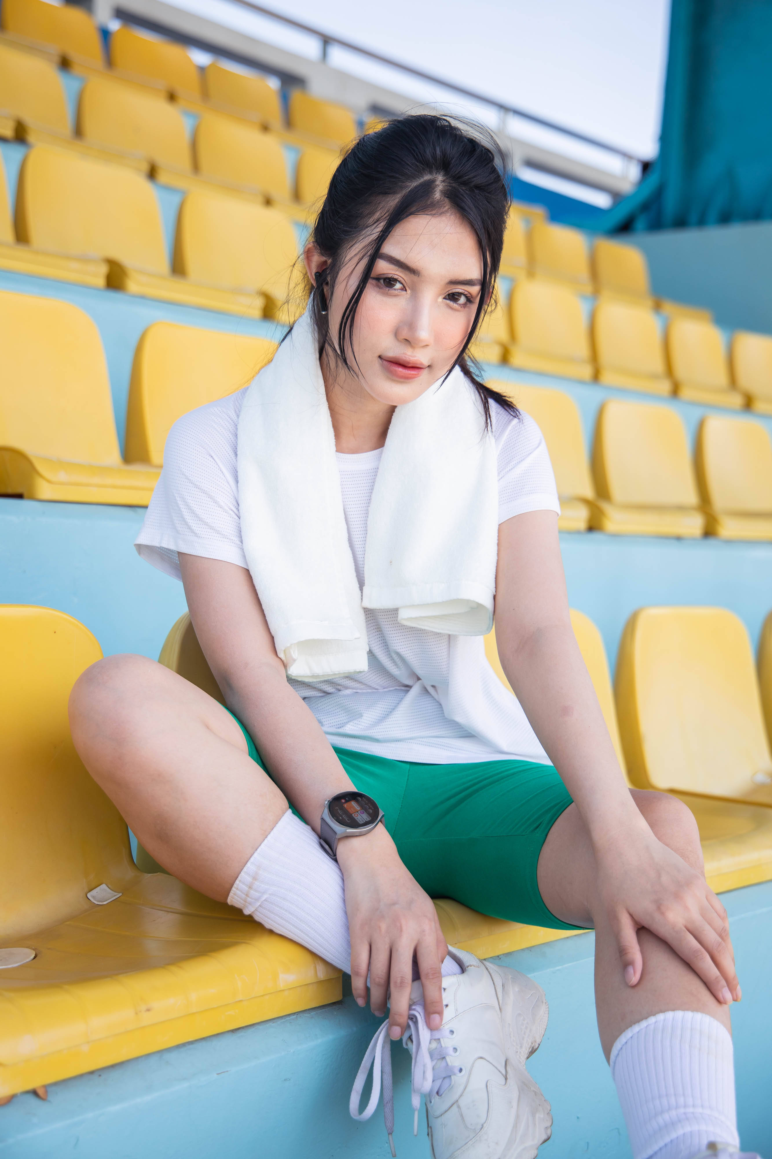 athletic woman, smartwatch, bright yellow stadium seats, 4K Phone Wallpaper