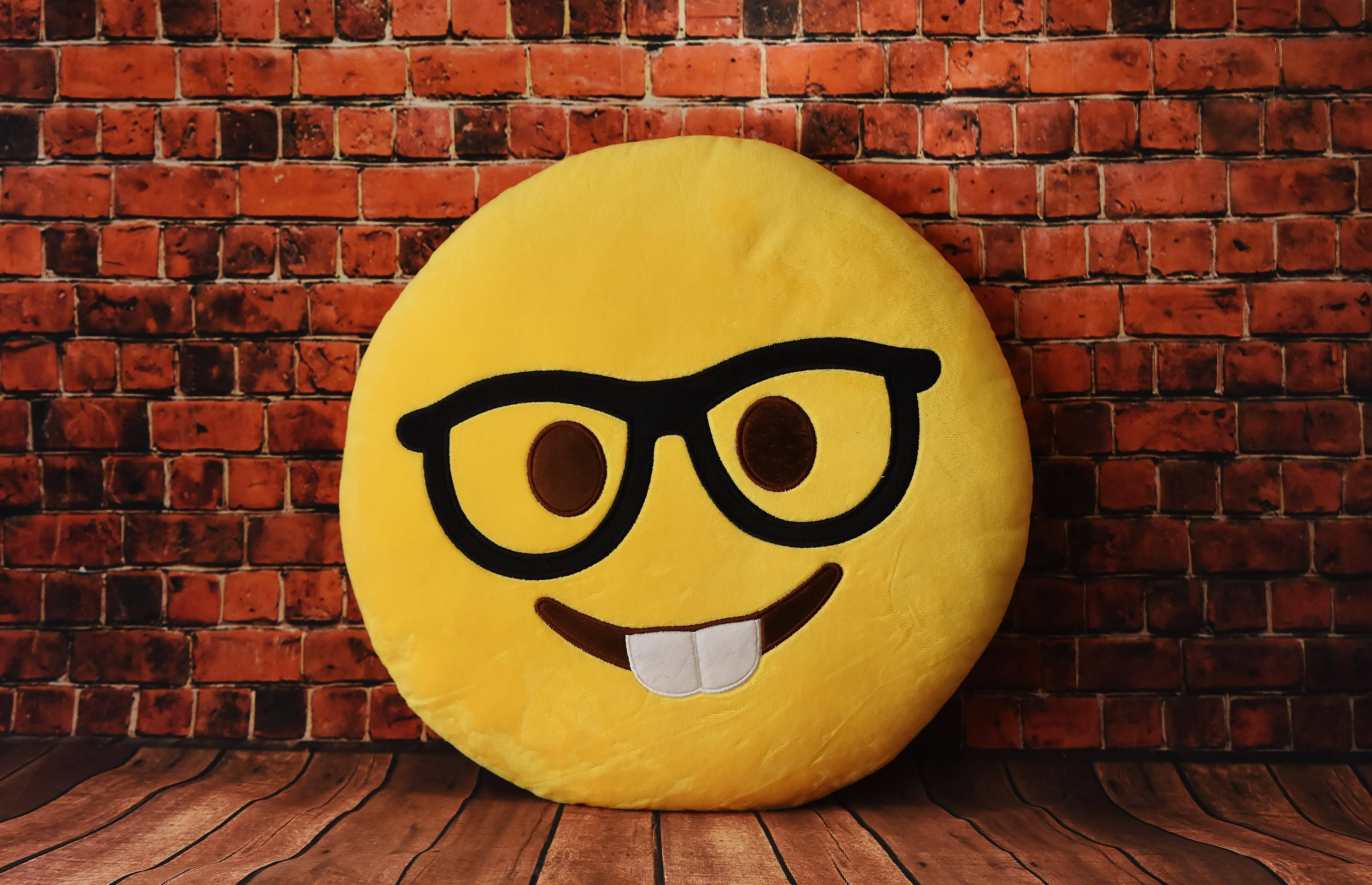 yellow plush emoji pillow, glasses, toothy grin, 5K Desktop Wallpaper