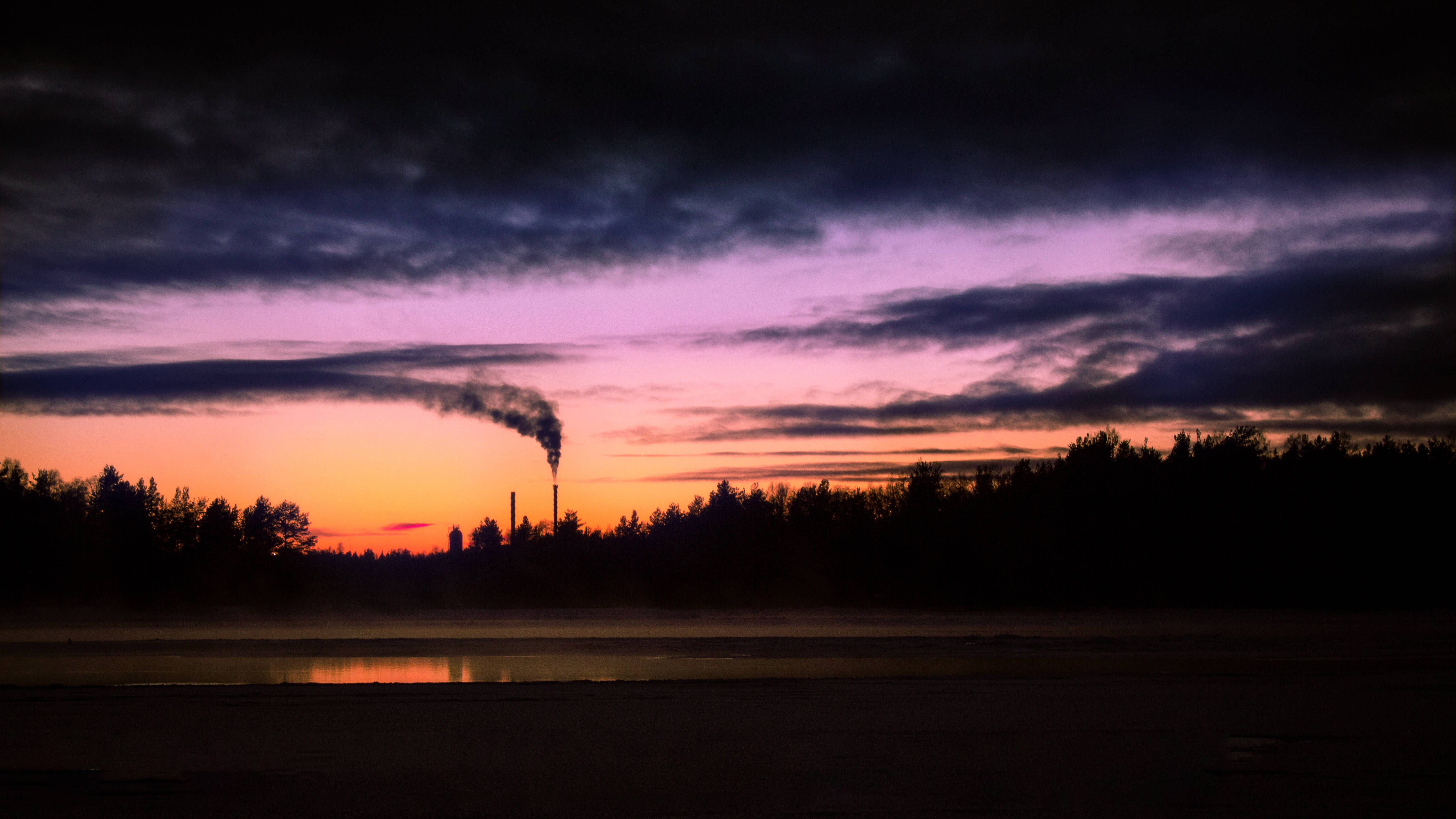 factory smokestack, vibrant purple orange twilight sky, misty forest, 5K Desktop Wallpaper
