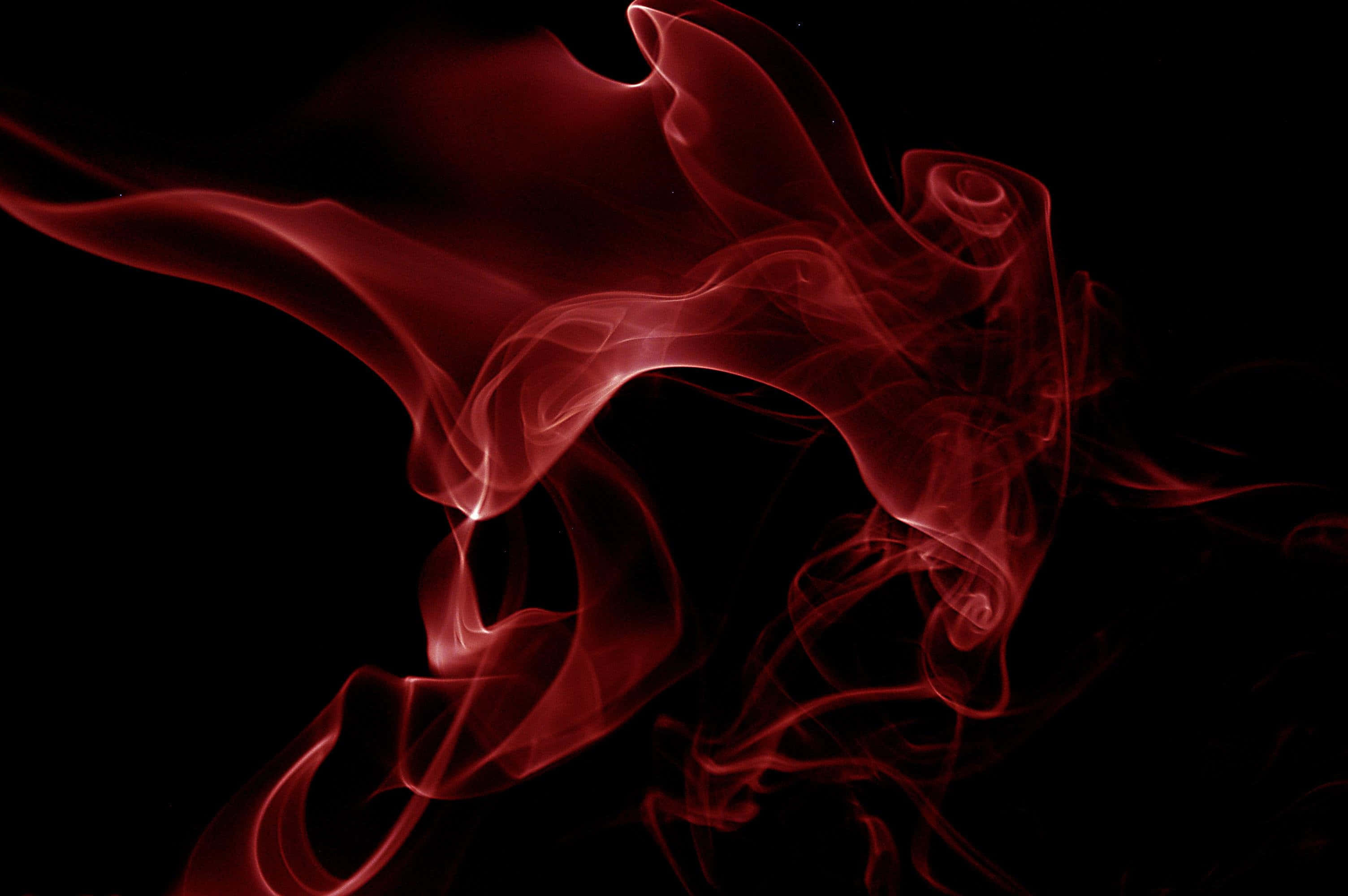 red smoke, black background, vibrant crimson smoke, 2K Desktop Wallpaper