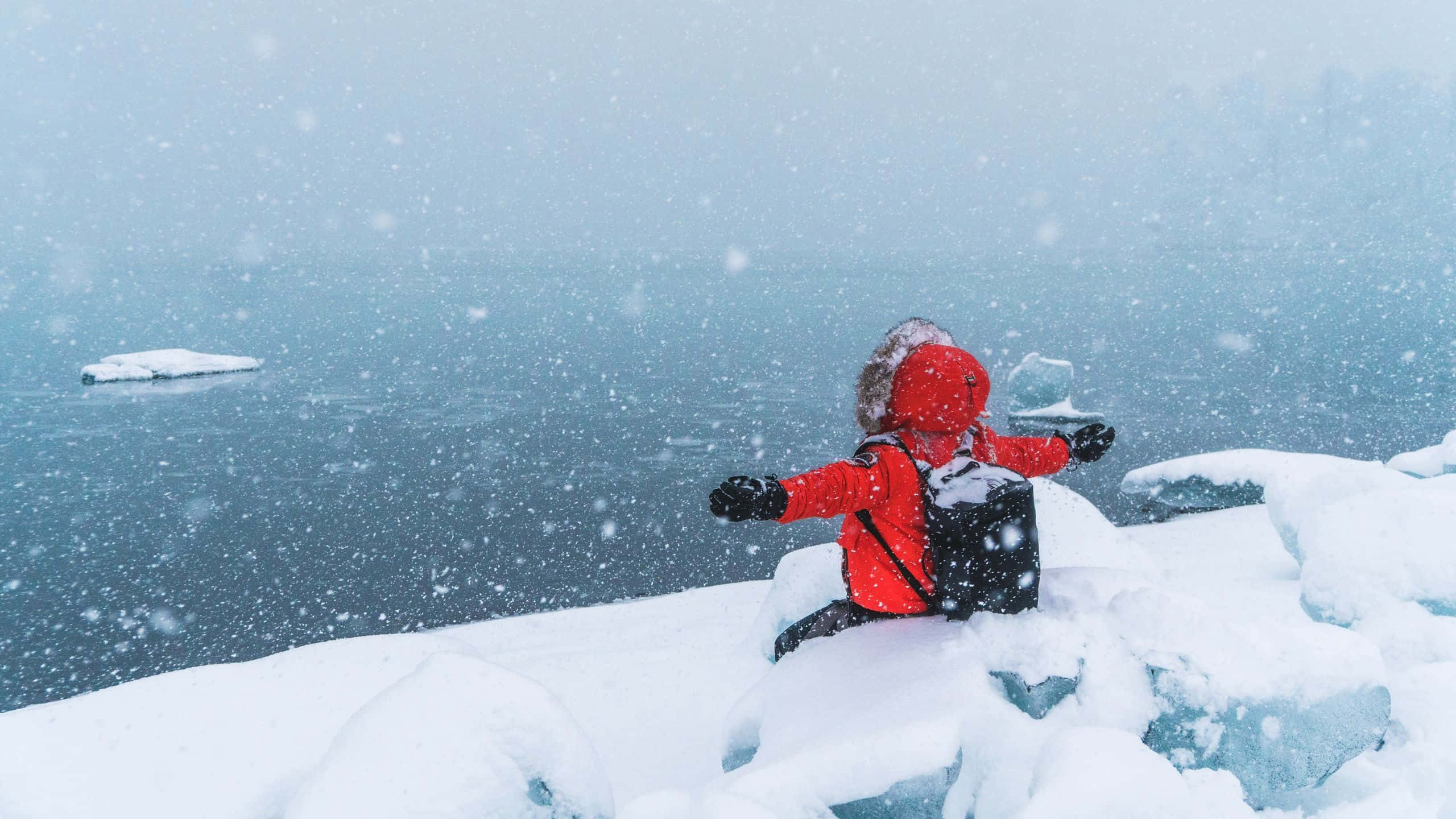 snow angel, bright red snowsuit, frozen lake, 2K Desktop Wallpaper