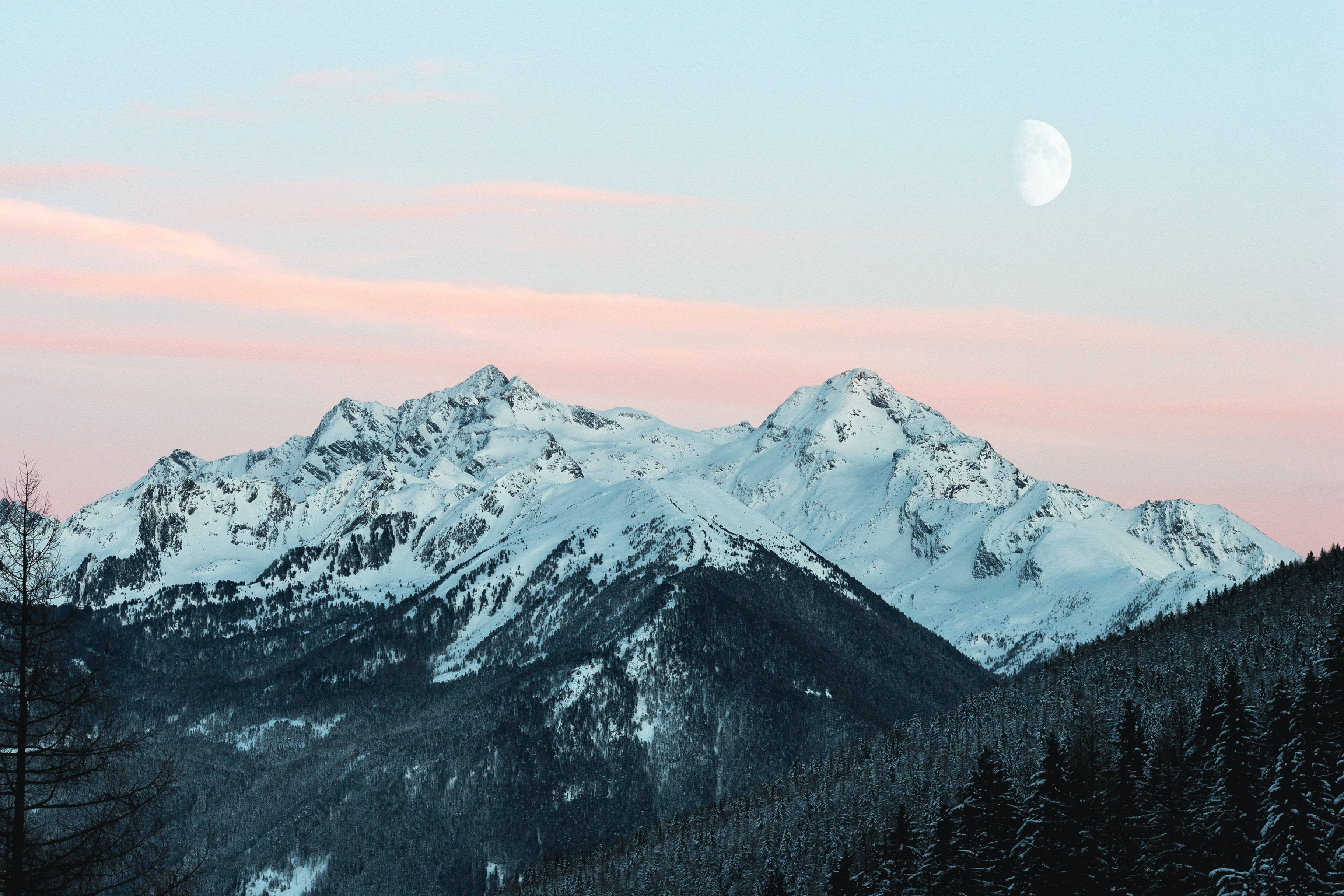 snowcapped mountain peaks, pastel sky, crescent moon, 2K Desktop Wallpaper