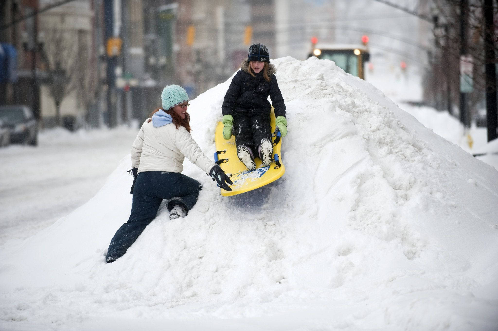 yellow sled, snowbank, snowy urban street, Full HD Desktop Wallpaper