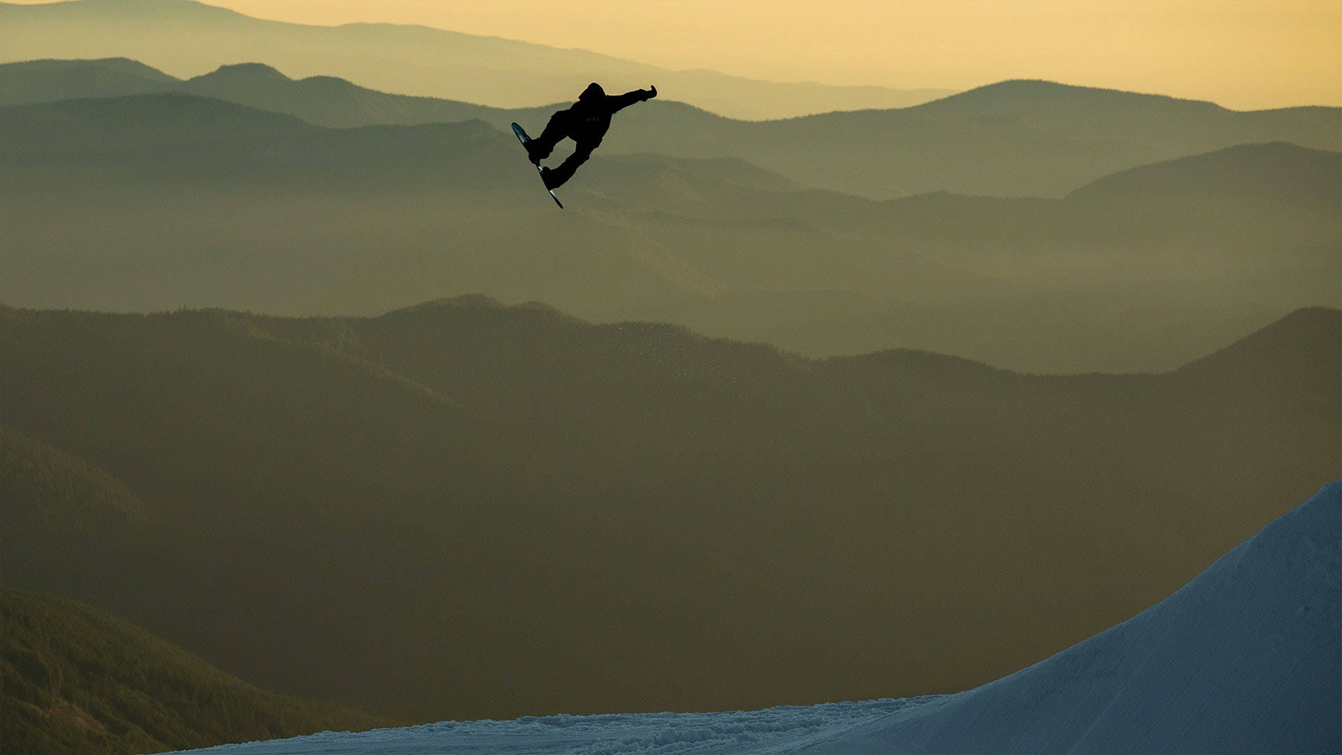snowboarder, mid-air, layered mountain ranges, Full HD Desktop Wallpaper
